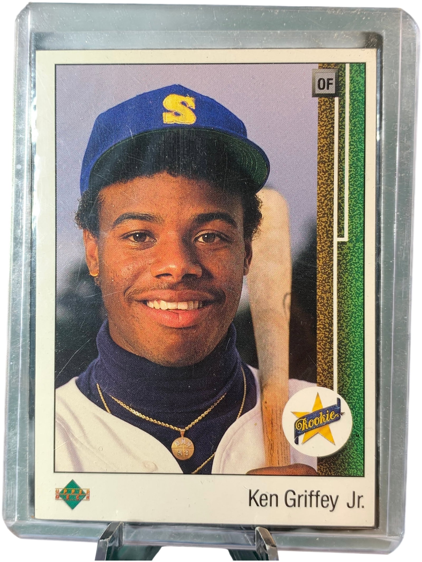 1989 Upper Deck Ken Griffey Jr. Star Rookie Card Number 1: This item is a 1989 Upper Deck Ken Griffey Jr. rookie baseball card, identified as card number 1 in the set. The card front features a color photograph of the player in a Seattle Mariners uniform with