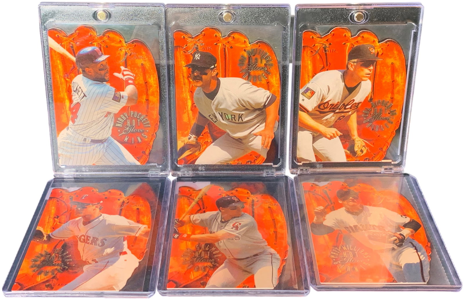 1994 Flair Hot Glove Baseball Insert Card Lot of 6: This lot features an assortment of baseball cards from the 1994 Flair Hot Glove insert set, manufactured by Fleer. The cards are characterized by a unique die-cut shape resembling a baseball glove and