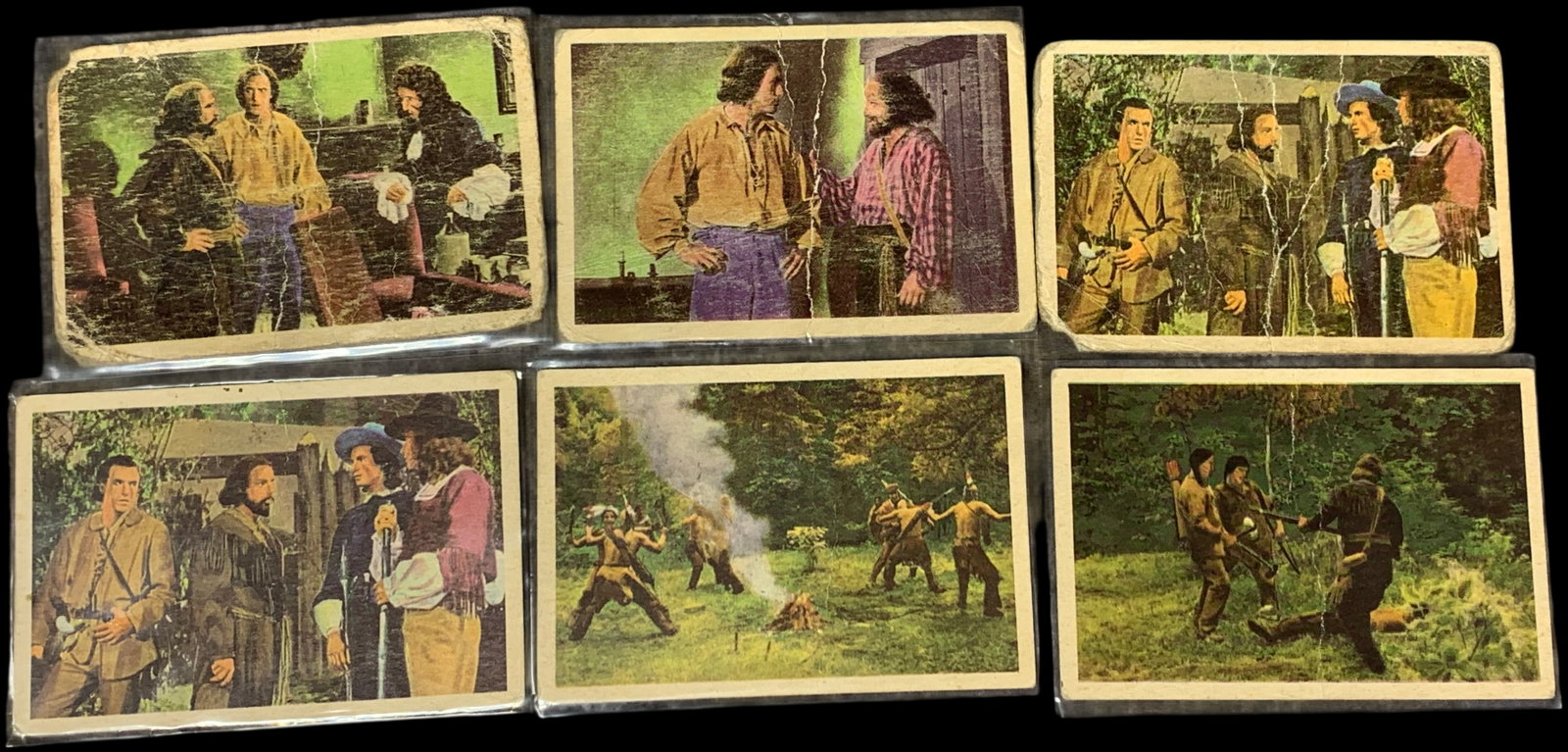 A Set of Six 1956 Adventures of Radisson Non-Sport Trading Cards: This lot features a collection of vintage non-sport trading cards from the 1956 production Adventures of Radisson. This series was a Canadian television production that aired on the CBC Network in Eng