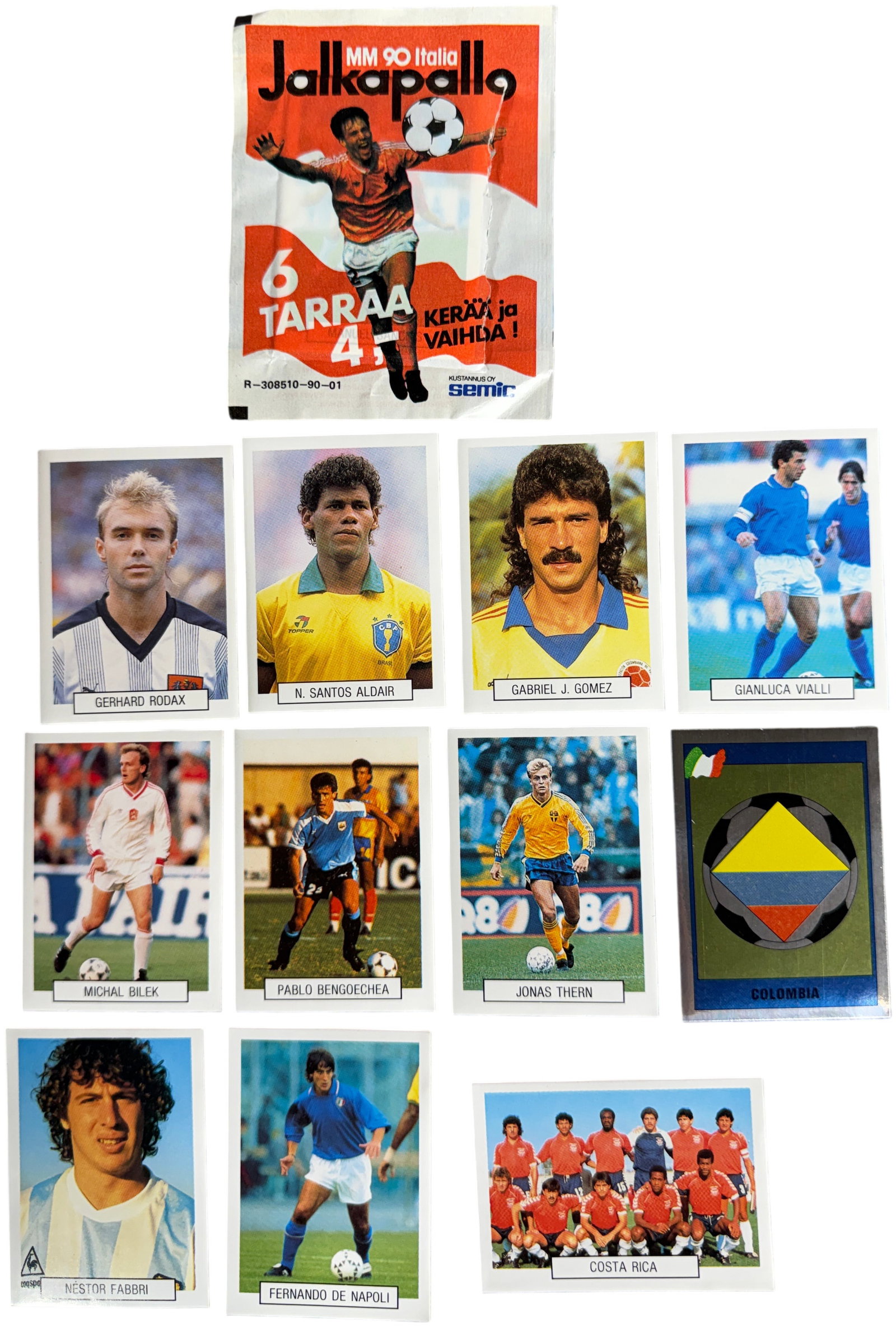 Collection of 1990 FIFA World Cup Italia A group of Soccer Stickers and Pack Wrapper by Semic: This group consists of unapplied vintage soccer stickers and An original opened pack wrapper from the 1990 FIFA World Cup (Italia 90). This collection is a regional edition published by Kustannus Oy S