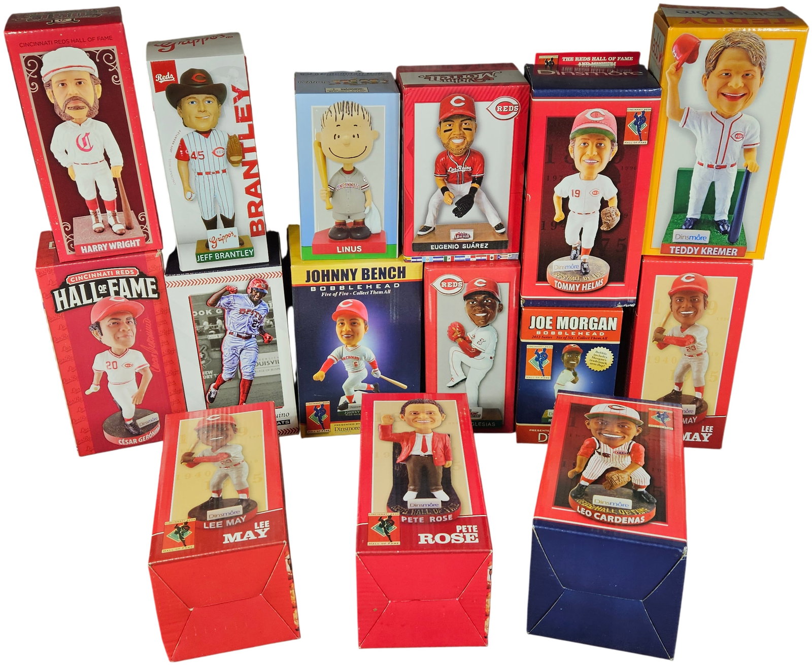 A Collection of Cincinnati Reds and Affiliate Hand Painted Bobbleheads: A collection of multiple hand-painted resin bobbleheads featuring the Cincinnati Reds and their affiliates. This assortment highlights several figures from the Cincinnati Reds Hall of Fame series pres