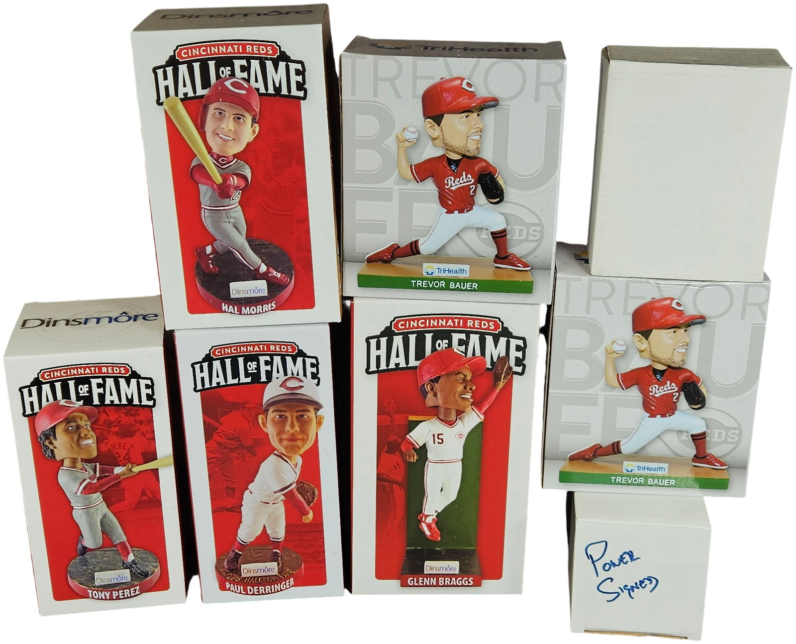 A Collection of Cincinnati Reds Hall of Fame and Promotional Bobbleheads: This collection features several Cincinnati Reds bobbleheads from the Hall of Fame series and various promotional giveaways. The Hall of Fame series, sponsored by Dinsmore, includes figures of Hal Mor