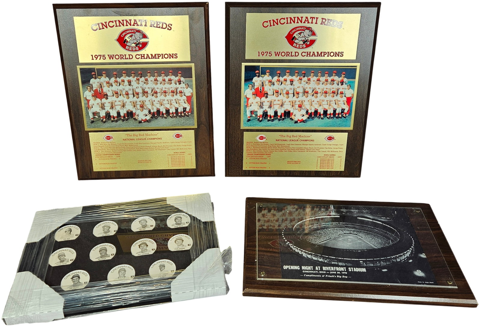 A Collection of Cincinnati Reds Big Red Machine Era Commemorative Plaques and Framed Memorabilia: This collection of Cincinnati Reds memorabilia commemorates the team's historic Big Red Machine era. The set includes matching wooden plaques celebrating the 1975 World Series Championship. These plaq