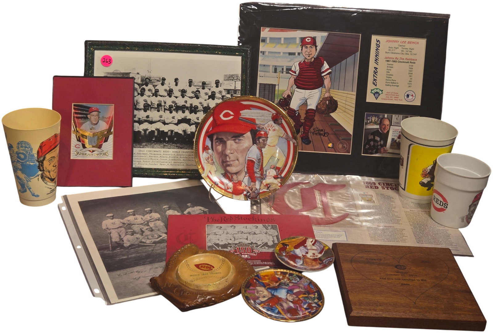 A Collection of Cincinnati Reds and Johnny Bench Memorabilia Including Framed Prints and Historical: This lot features an assortment of Cincinnati Reds and Johnny Bench memorabilia. Central to the collection is a framed and matted Toon Art print by Sam Viviano depicting Johnny Bench, bearing an unver