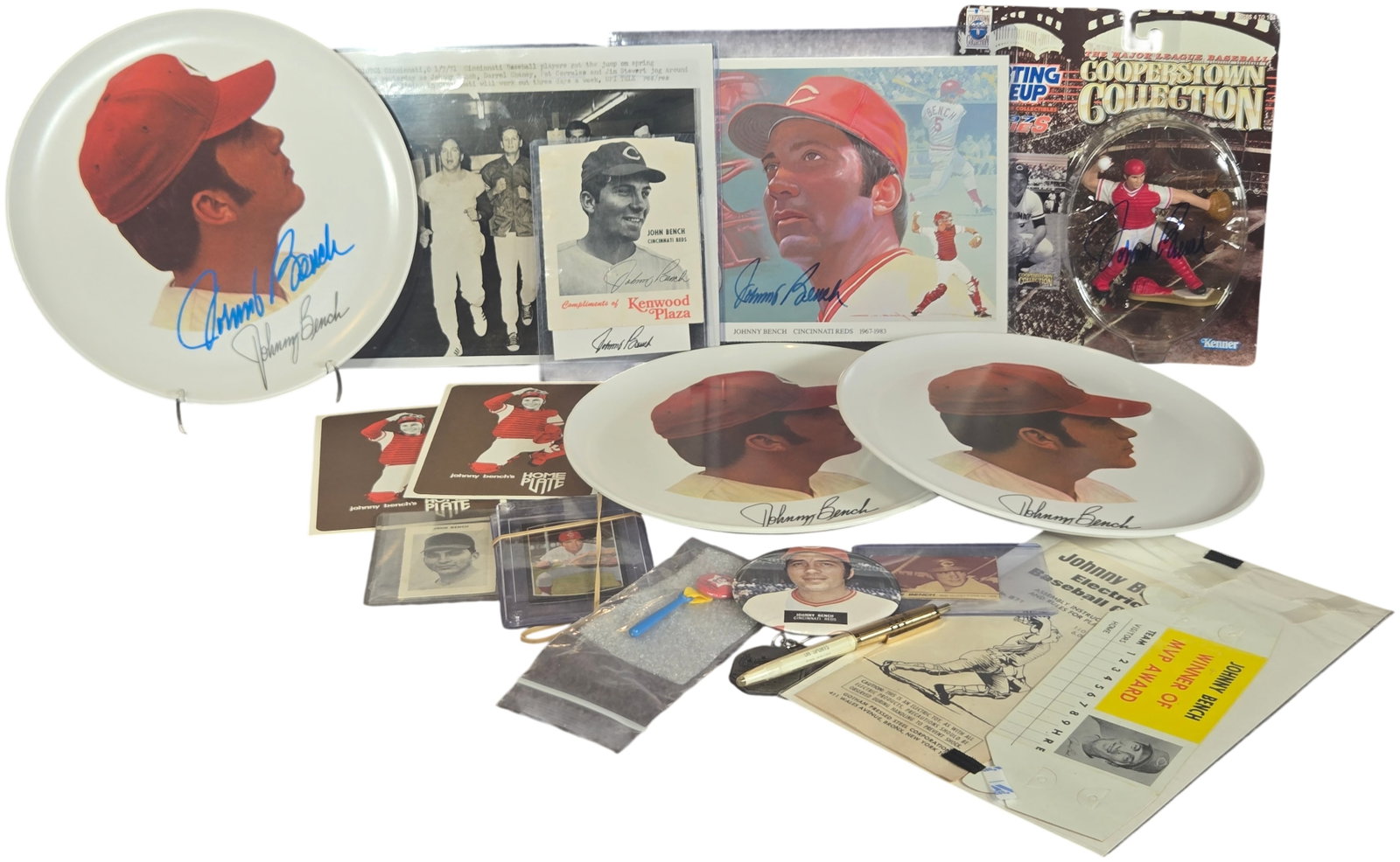 A Collection of Johnny Bench Cincinnati Reds Memorabilia and Hand-Signed Items: This collection features a variety of vintage memorabilia and hand-signed items relating to Cincinnati Reds Hall of Fame catcher Johnny Bench. The assembly includes commemorative porcelain-style portr