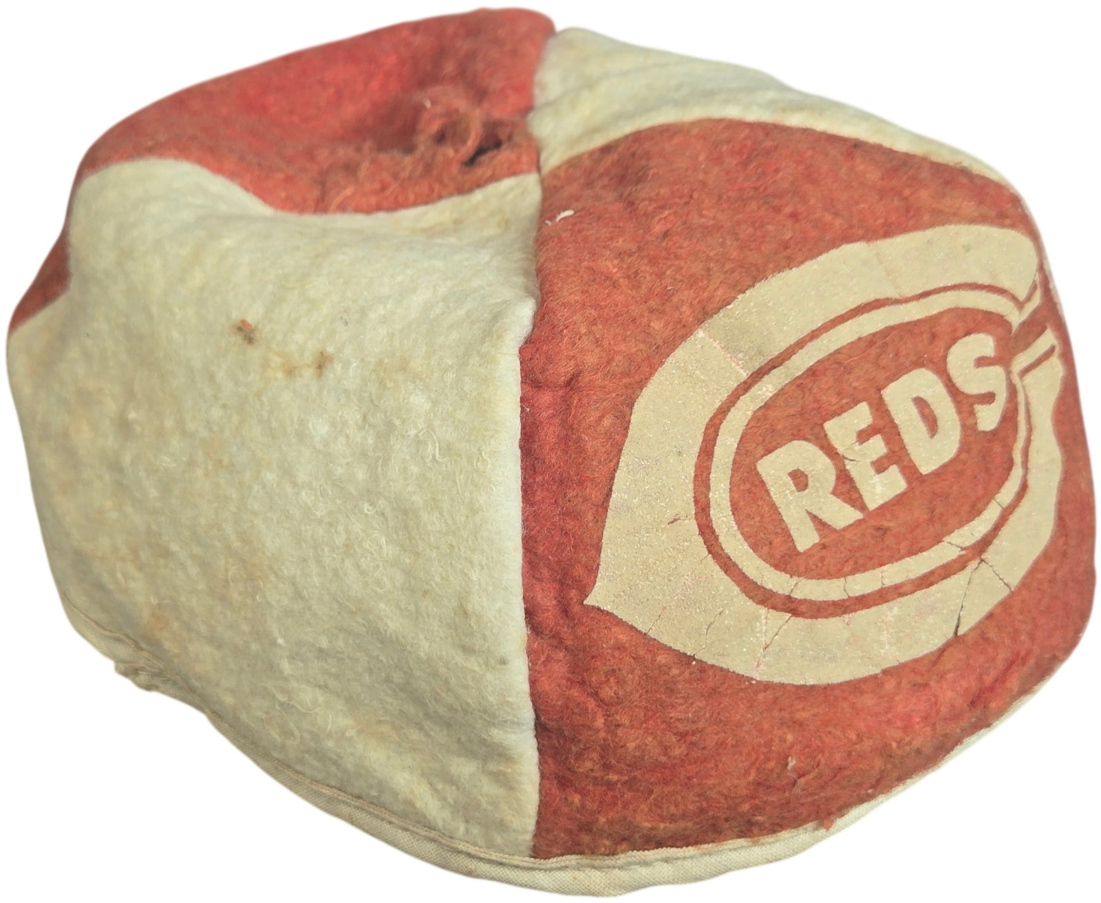 Vintage Cincinnati Reds Felt Beanie Cap with Acrylic Display Case: This vintage souvenir baseball cap is associated with the Cincinnati Reds. The beanie style cap is constructed from a group of alternating panels of red and off-white felt. The panels converge at the 