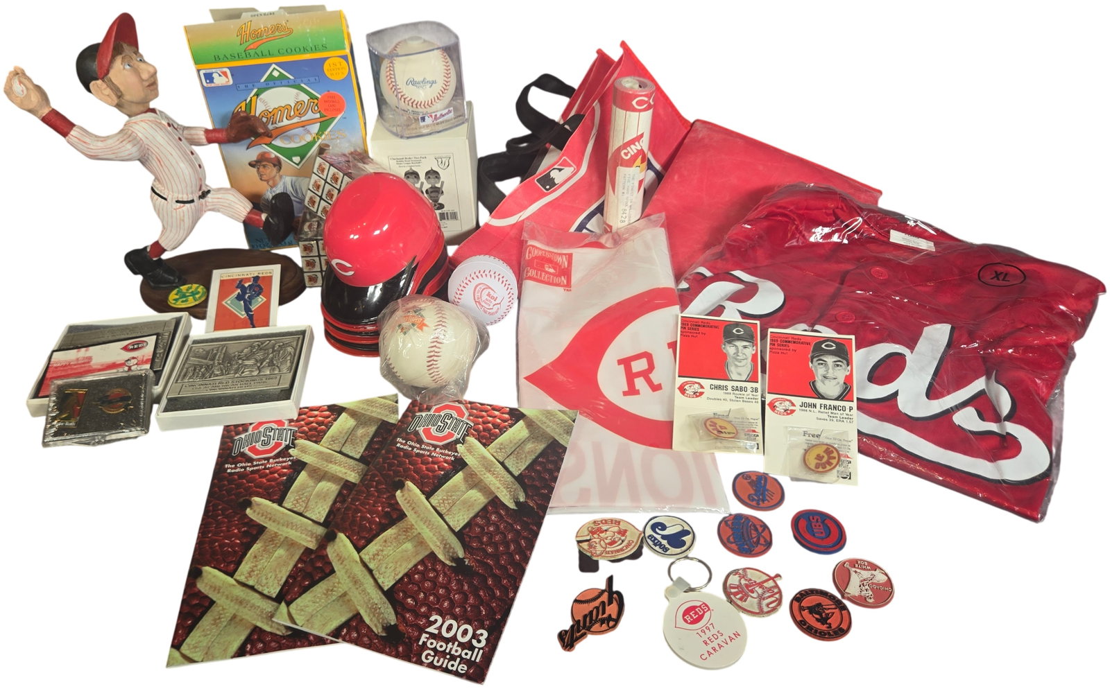 A Collection of Cincinnati Reds and Ohio State Buckeyes Sports Memorabilia and Souvenirs: This lot features an assortment of sports-related memorabilia and promotional items primarily focused on the Cincinnati Reds baseball team and the Ohio State Buckeyes football program. Included is a r