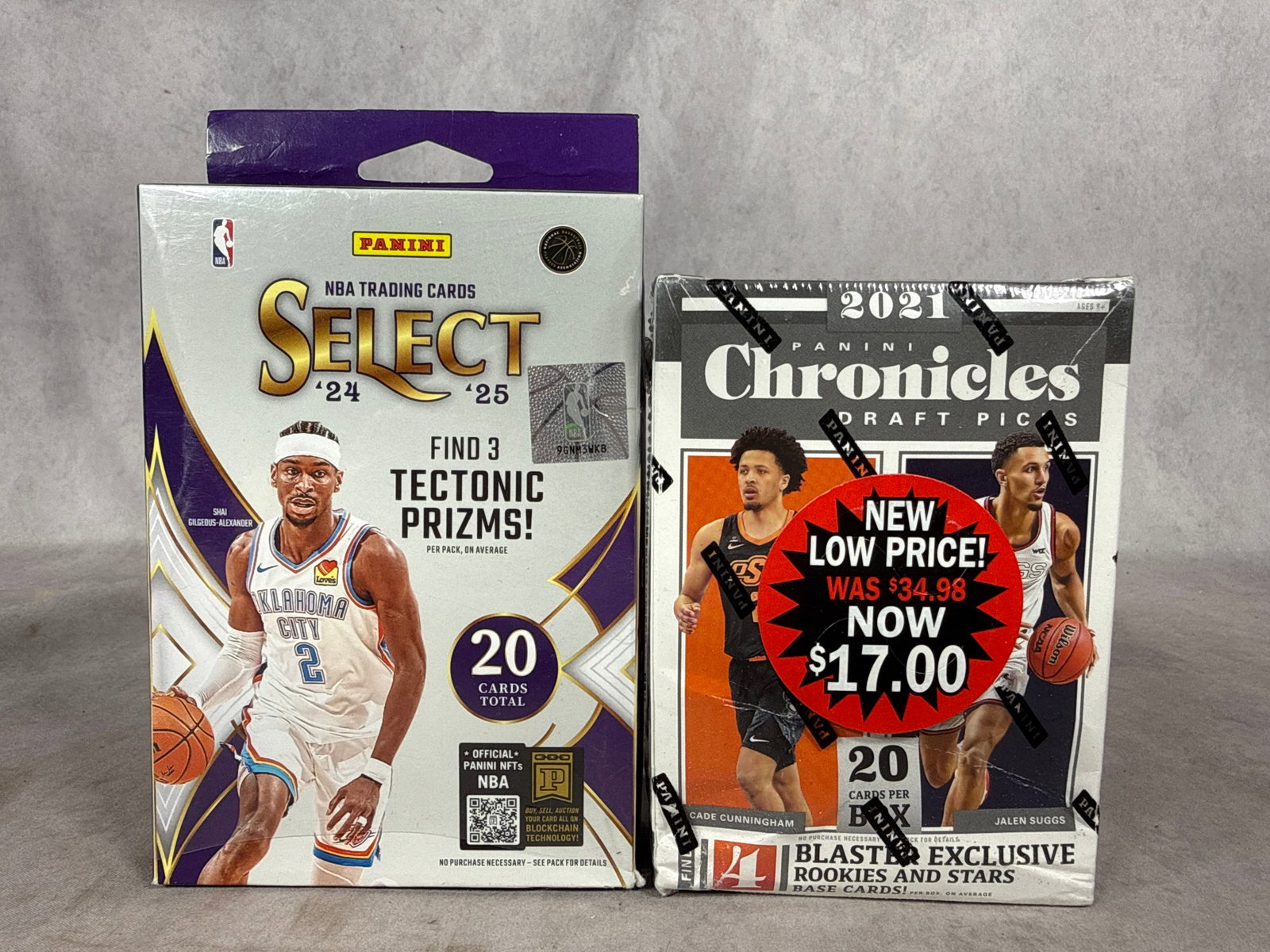 Panini Basketball Trading Card Boxes Including 2024-25 Select NBA Hanger and 2021 Chronicles Draft: This lot consists of factory-sealed basketball trading card products manufactured by Panini, representing both professional NBA and collegiate draft releases. The first item is a 2024-25 Panini Select