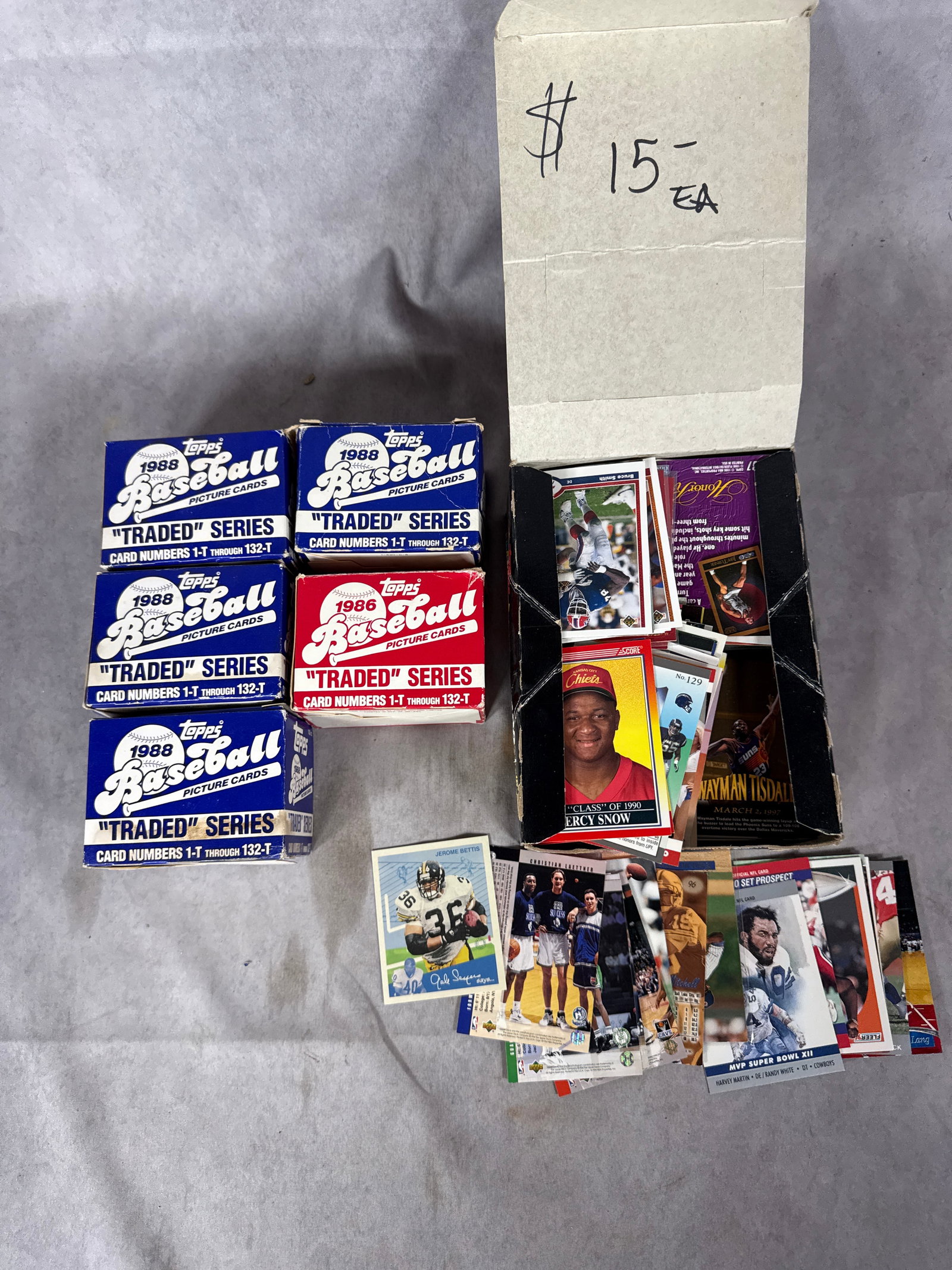 A Collection of Topps Baseball Traded Series Sets and Multi-Sport Trading Cards: This collection features a group of factory-issued Topps Baseball Traded Series sets and an assortment of loose professional sports trading cards. The factory sets consist of one 1986 Topps Baseball T