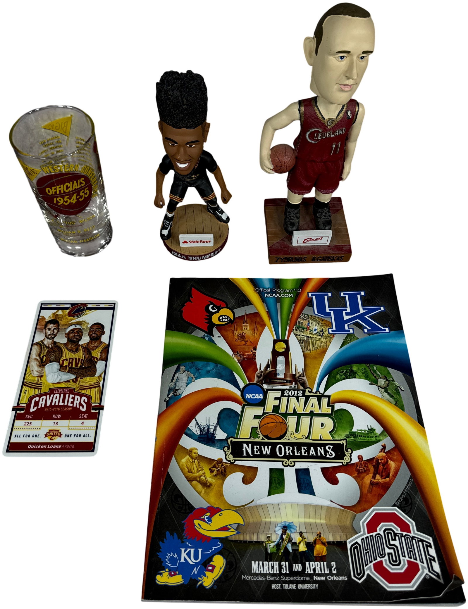 An Assortment of Basketball Memorabilia Featuring Cleveland Cavaliers Bobbleheads and NCAA: This lot consists of an assortment of collegiate and professional basketball memorabilia. Included is a clear glass commemorative tumbler for the 1954-55 Big Ten Western Conference Officials. The fron