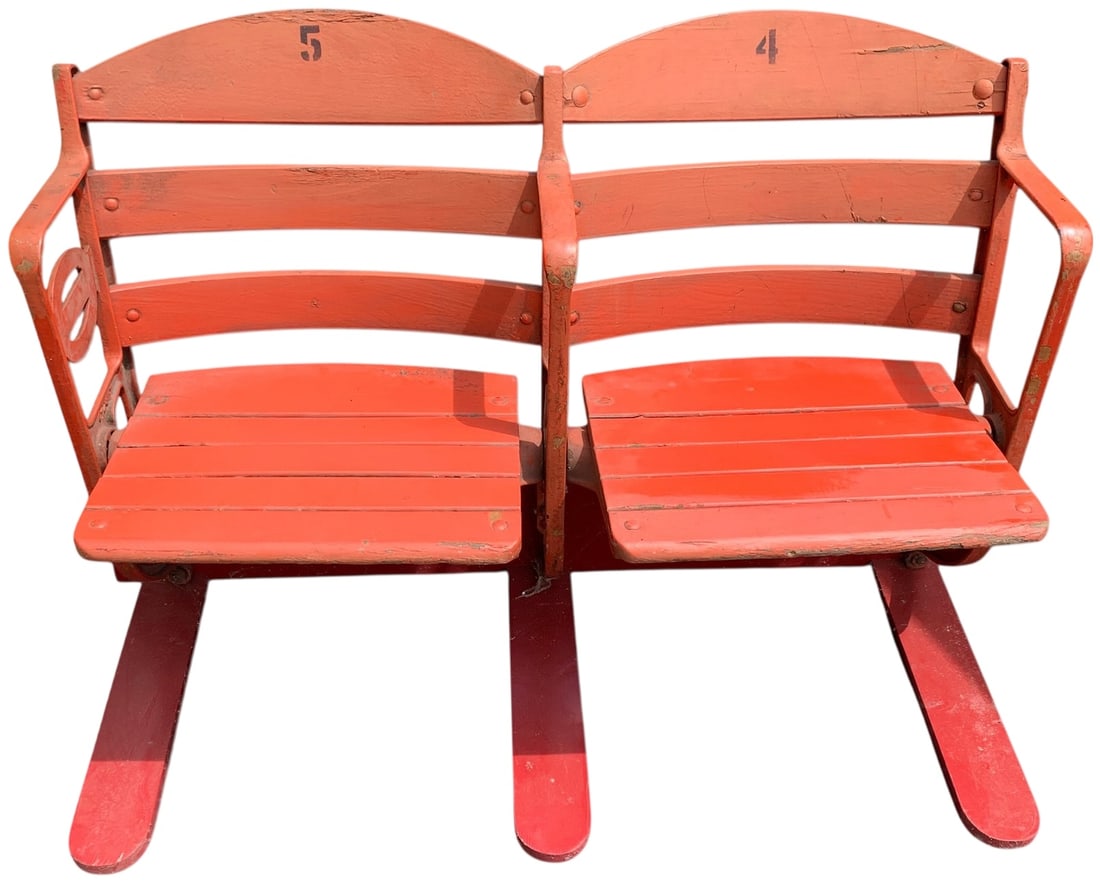 A Pair of Crosley Field Cincinnati Reds Stadium Seats: This pair of vintage stadium seats is attributed to Crosley Field, the former home of the Cincinnati Reds Major League Baseball franchise from 1912 to 1970. The seats are constructed with cast iron en
