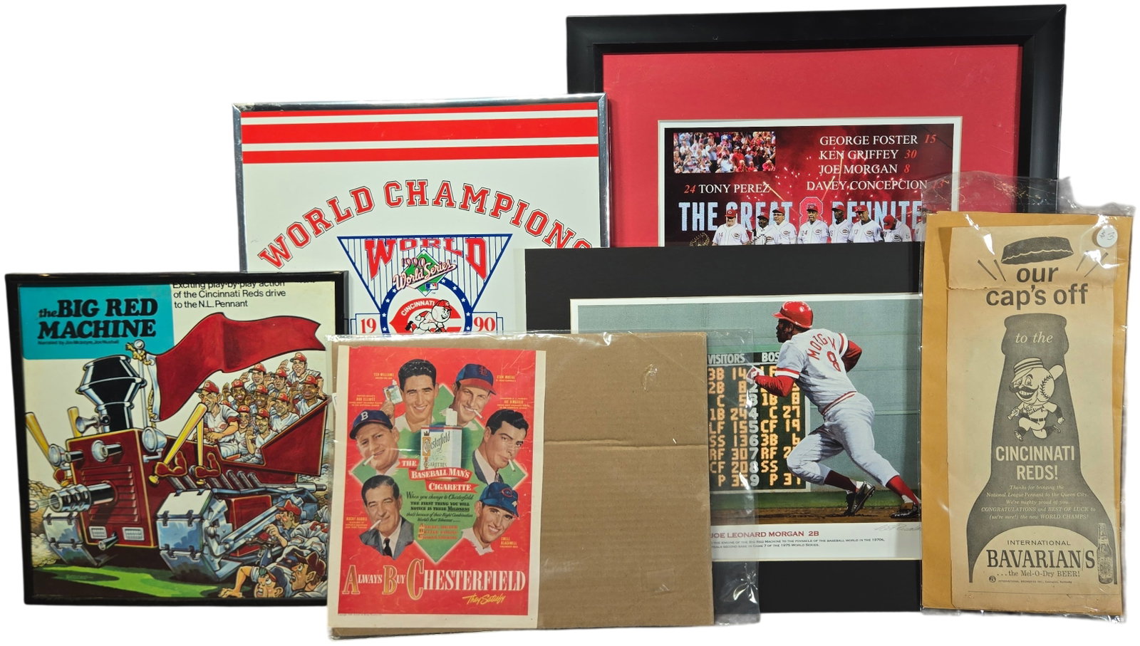A Collection of Cincinnati Reds Baseball Memorabilia and Ephemera: This assortment of Cincinnati Reds memorabilia commemorates various eras of the franchise, including the 1970s Big Red Machine and the 1990 World Series championship. The collection features a limited