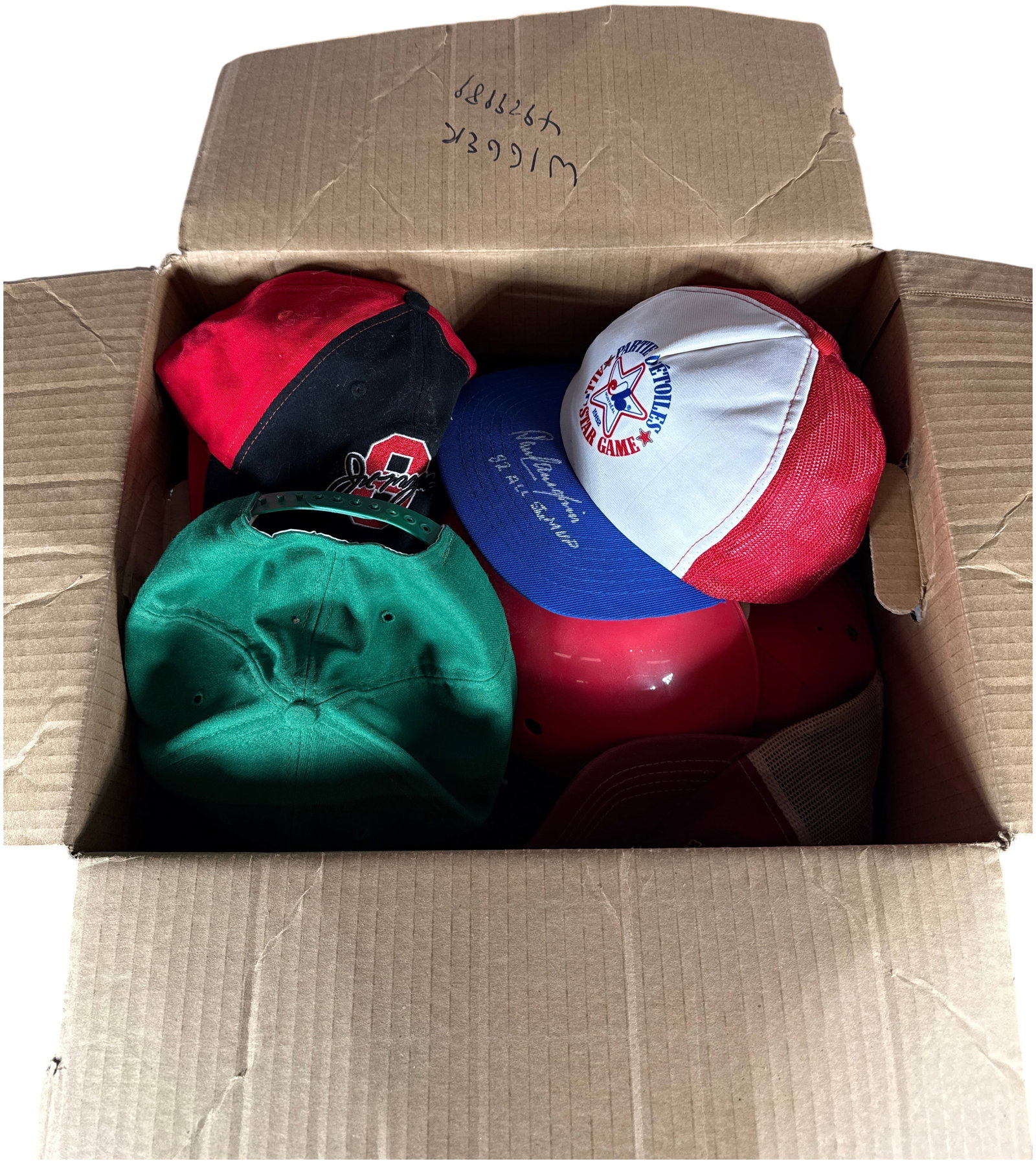 An Assortment of Cincinnati Reds and Major League Baseball Memorabilia Including Caps and Batting (1 of 17)