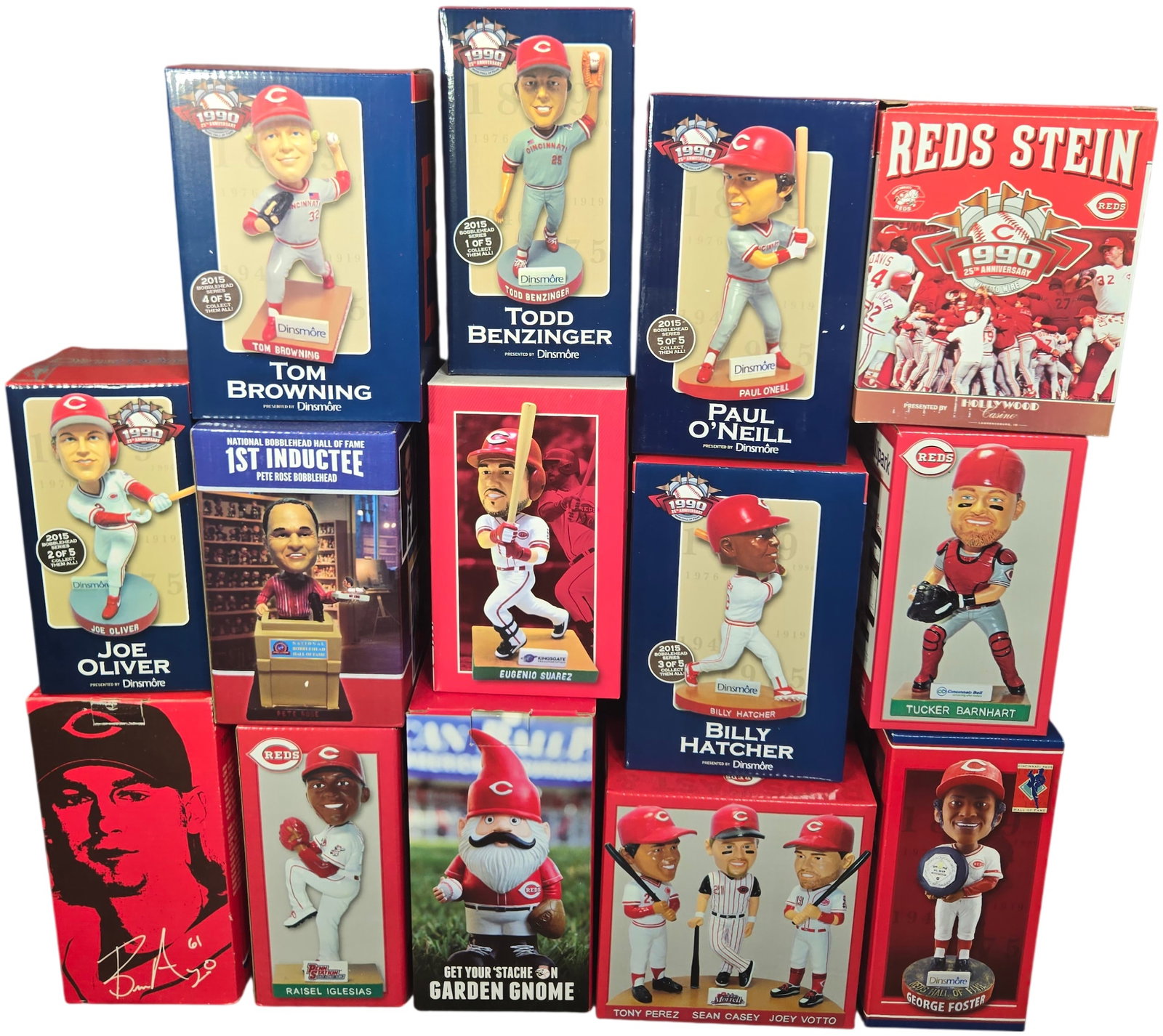 A Collection of Cincinnati Reds Promotional Bobbleheads and Commemorative Stein: A group of boxed items celebrating the Cincinnati Reds, headlined by a complete five-piece 2015 Bobblehead Series commemorating the 25th Anniversary of the 1990 World Series. This set, presented by Di