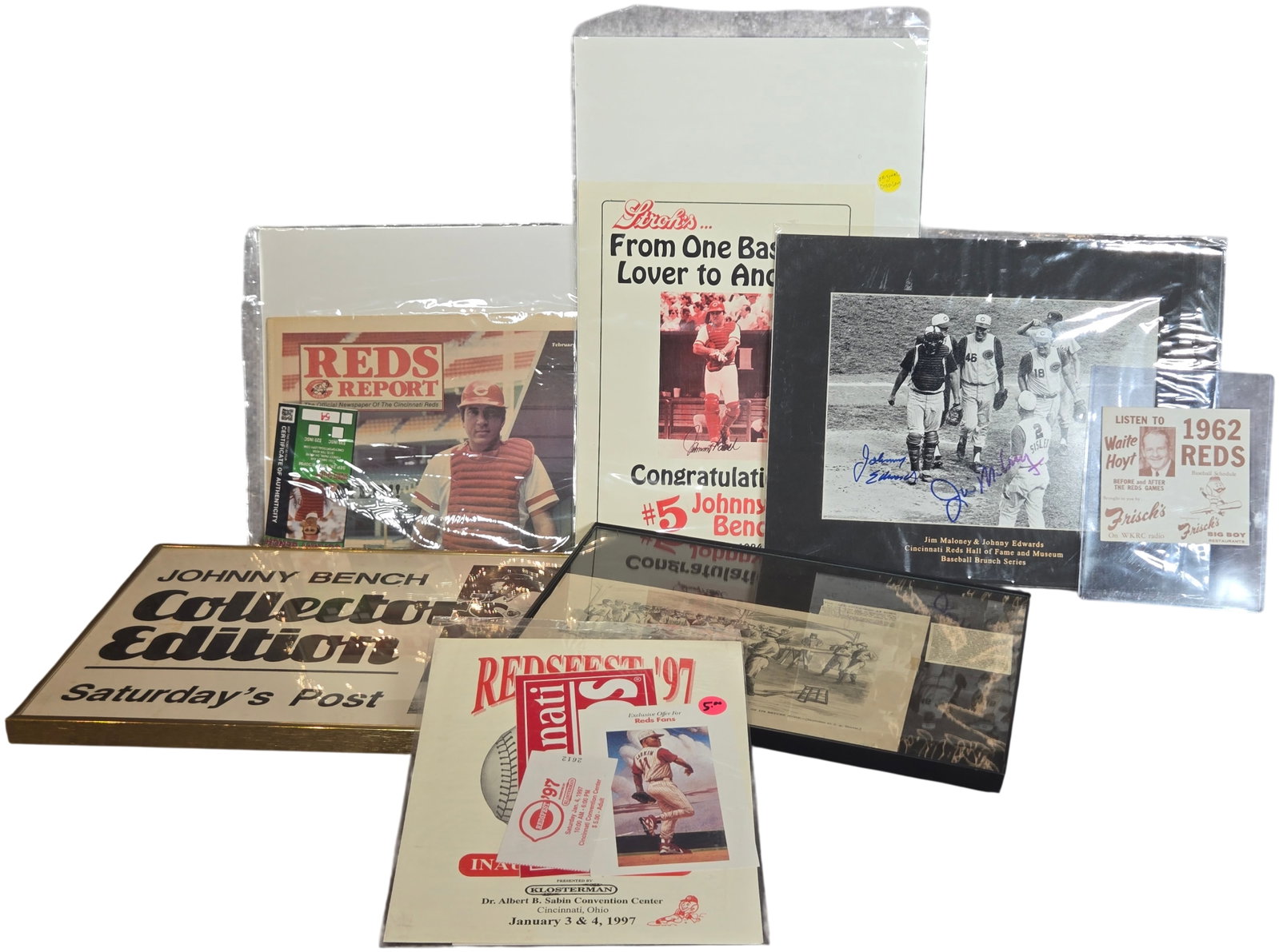 A Collection of Cincinnati Reds Baseball Memorabilia and Ephemera Including Signed Photos and Johnny: An assortment of Cincinnati Reds baseball memorabilia focusing on team history and Big Red Machine era figures. The collection includes a matted photograph of Jim Maloney and Johnny Edwards walking