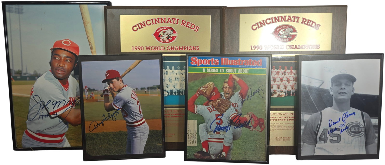 A Collection of Cincinnati Reds Autographed Photographs, Signed Sports Illustrated Magazine, and: This assortment features a variety of memorabilia from the Cincinnati Reds baseball franchise. The collection includes a framed 8 by 10 inch color photograph of Hall of Fame second baseman Joe