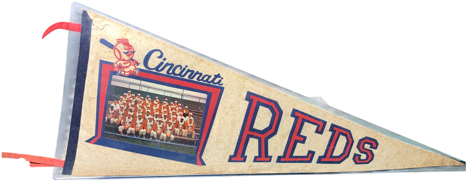 1964 Cincinnati Reds Vintage Picture Pennant with Team Roster Label: A vintage felt baseball pennant from the 1964 Cincinnati Reds season. The pennant features a cream-colored felt body with blue and red screen-printed block lettering reading Cincinnati REDS. To the le