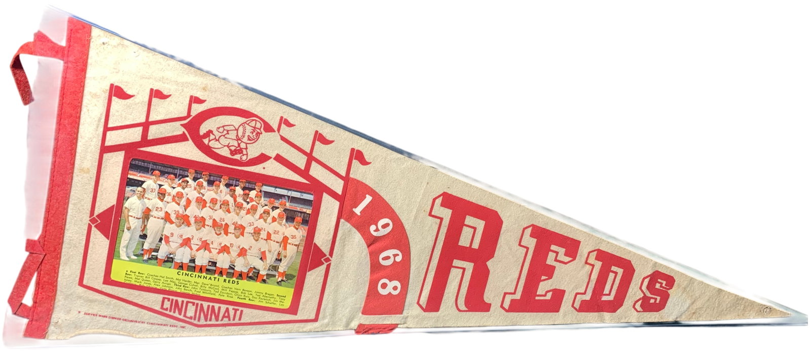 Vintage 1968 Cincinnati Reds Baseball Pennant with Team Photo and Roster: A vintage full-sized felt pennant for the Cincinnati Reds Major League Baseball team, dated 1968. The pennant features a white felt body with large red block lettering spelling REDS and a curved red b