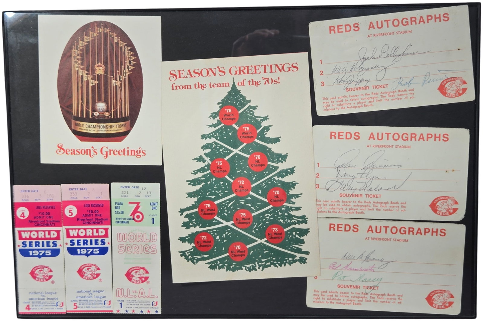 A Collection of Cincinnati Reds World Series Ticket Stubs, Team Christmas Cards, and Signed: A collection of Cincinnati Reds baseball memorabilia from the Big Red Machine era of the 1970s. The group includes World Series ticket stubs from Riverfront Stadium: a Game a ticket from the 1976 seri