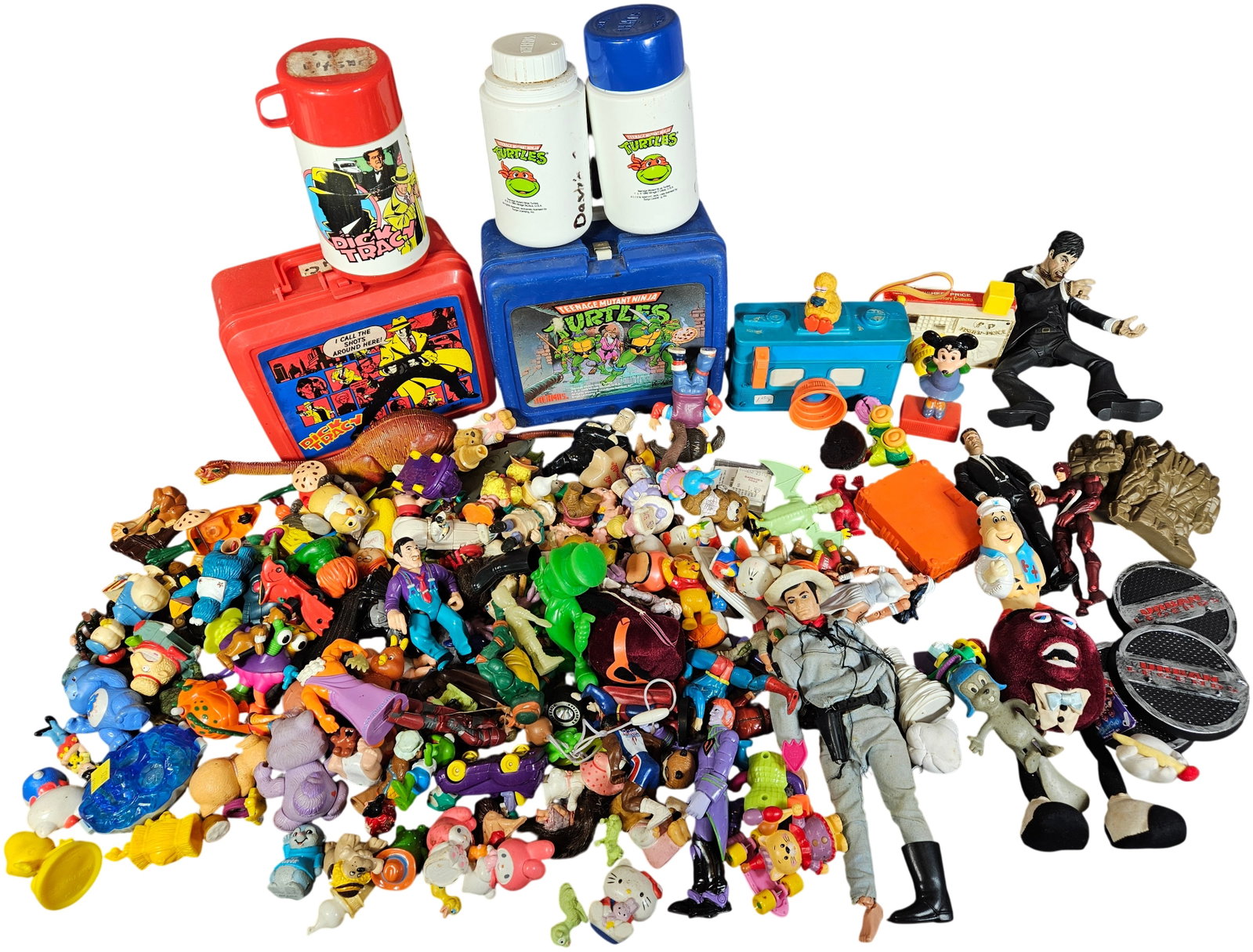 A Collection of Vintage Kids Meal Toys, Lunch Boxes, and Action Figures Including Dick Tracy and (1 of 6)