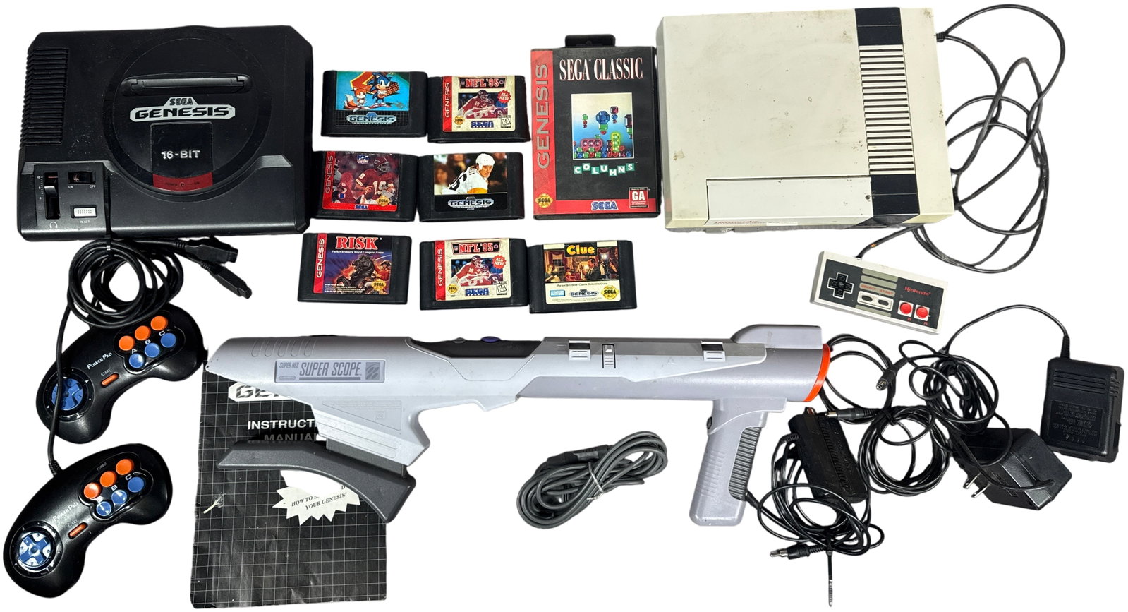 A Collection of Vintage Nintendo and Sega Video Game Consoles, Peripherals, and Software (1 of 13)