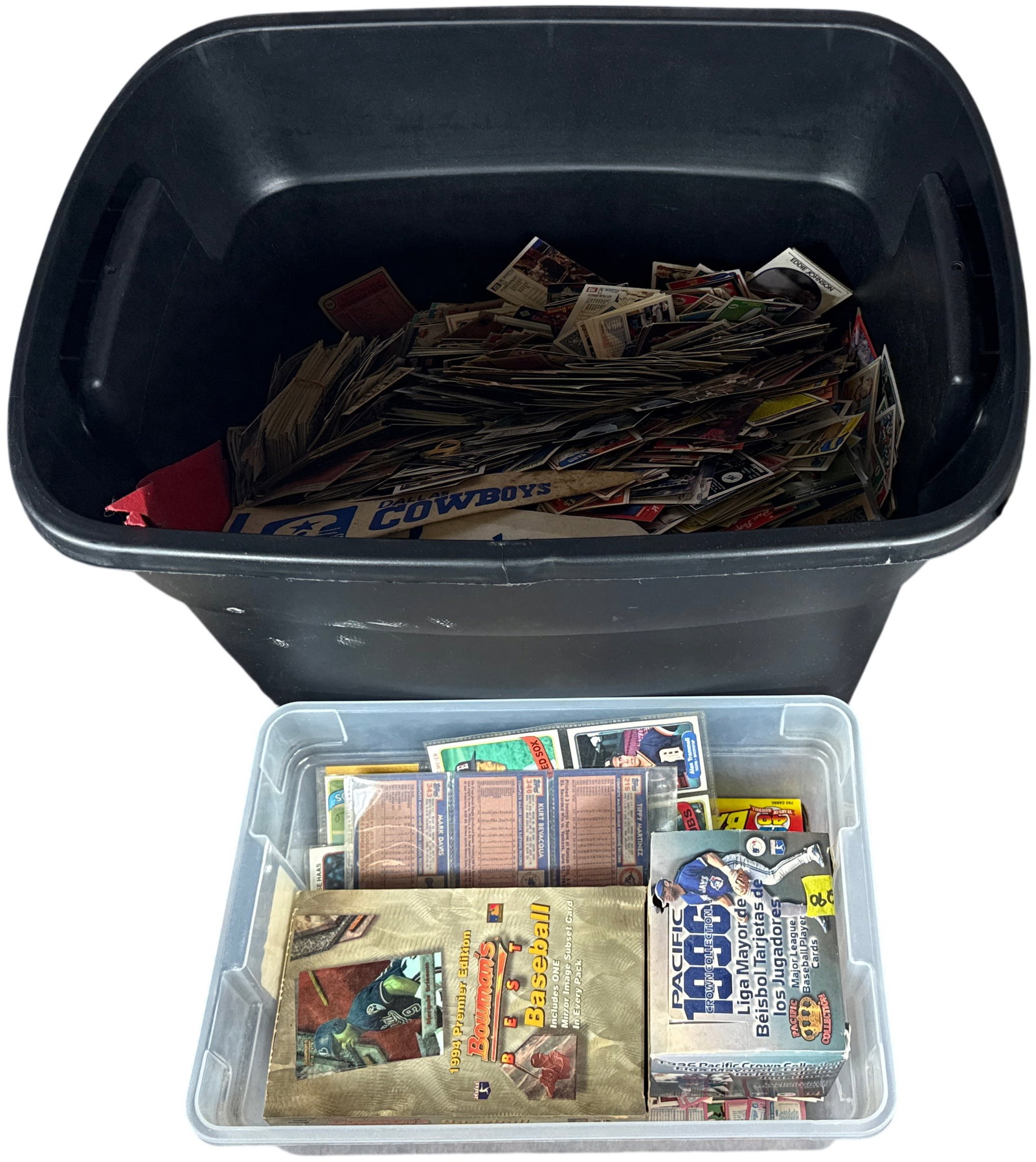 A Large Collection of Professional Sports Trading Cards and Memorabilia: An expansive collection of sports memorabilia and trading cards primarily spanning from the 1970s through the early 2000s. The lot contains several a group of trading cards representing Major League B