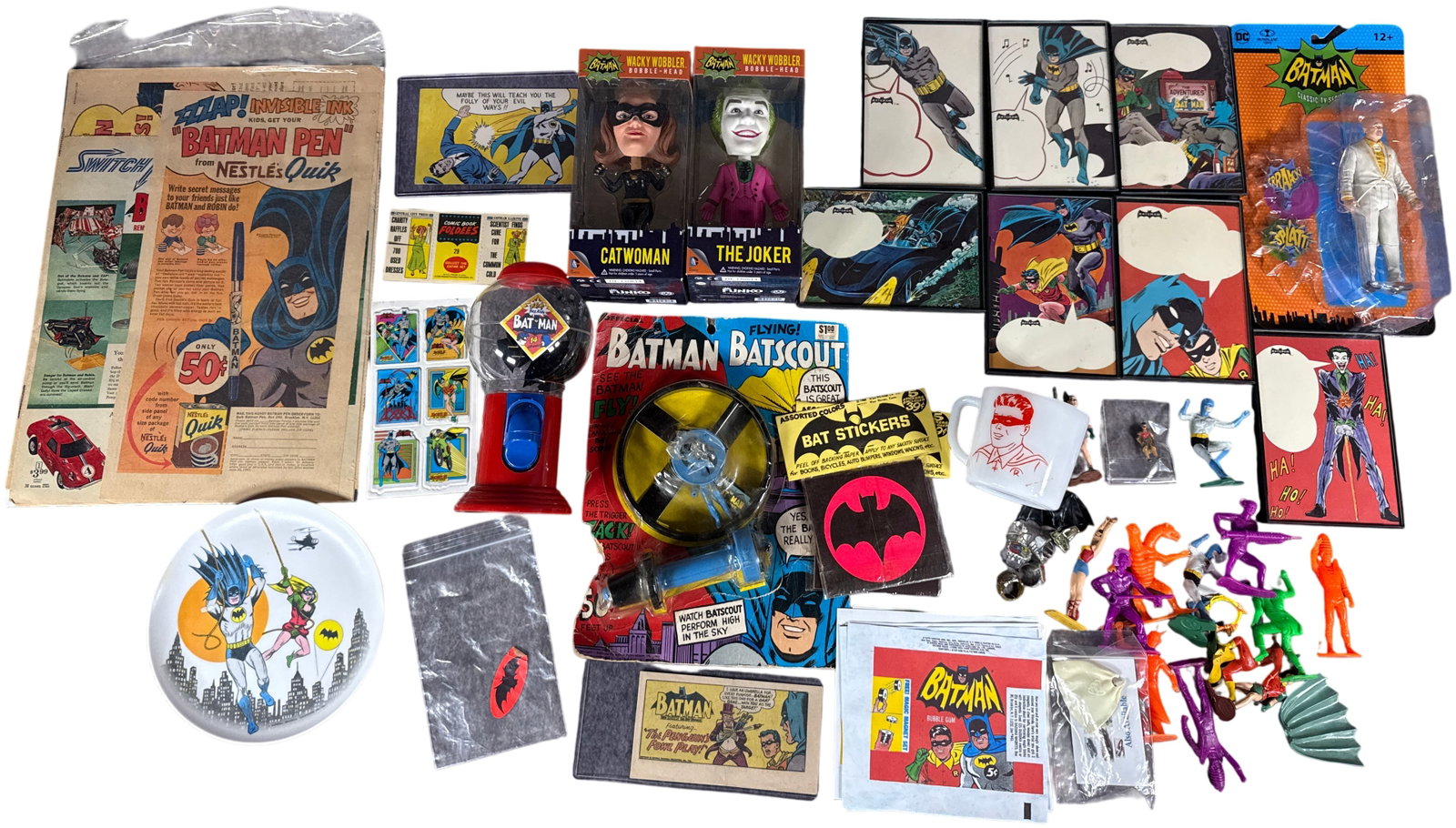 An Assortment of Vintage and Modern Batman Memorabilia and Collectibles: This collection features a diverse array of Batman-themed items primarily originating from the 1960s "Batmania" era, supplemented by modern character collectibles. The lot is highlighted by a vintage 