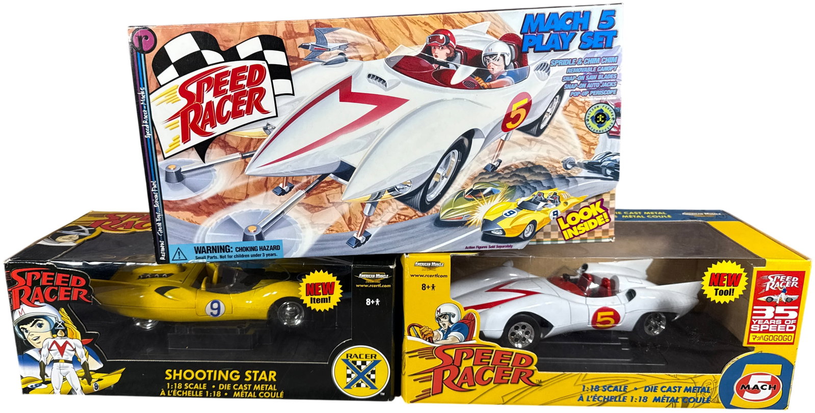 Speed Racer Collectible Vehicles by Ertl and ReSaurus: This collection consists of three Speed Racer themed vehicles in their original retail packaging. The group includes two 1:a group of scale die-cast metal models produced by Ertl under the American Mu