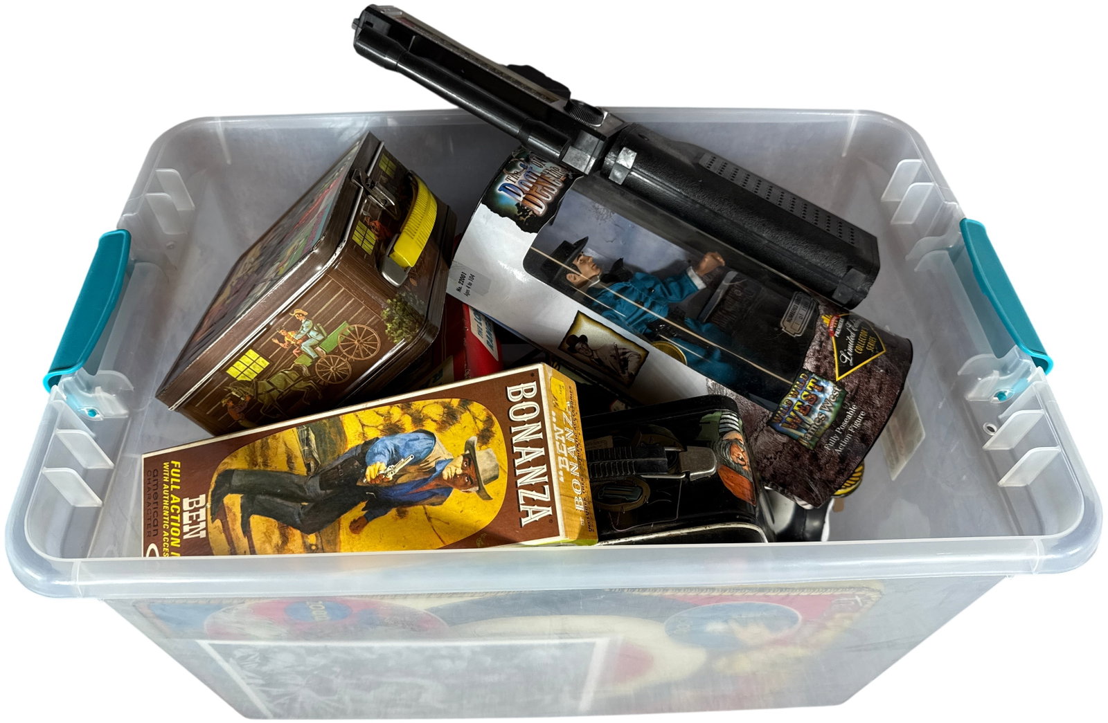 A Collection of Vintage Western Television and Character Toys and Memorabilia: This collection contains an assortment of Western-themed toys and television memorabilia spanning several decades. The lot features lithographed tin lunchboxes manufactured by Aladdin Industries Incor
