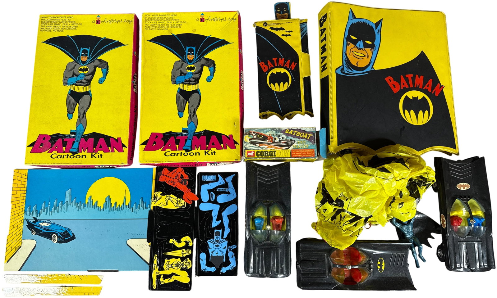 A Collection of Vintage Batman Memorabilia and Toys including Colorforms and Standard Plastic: This collection consists of various vintage toys and memorabilia themed after the 1966 Batman television series. The lot features original Colorforms Batman Cartoon Kits, Product number 401, manufactu