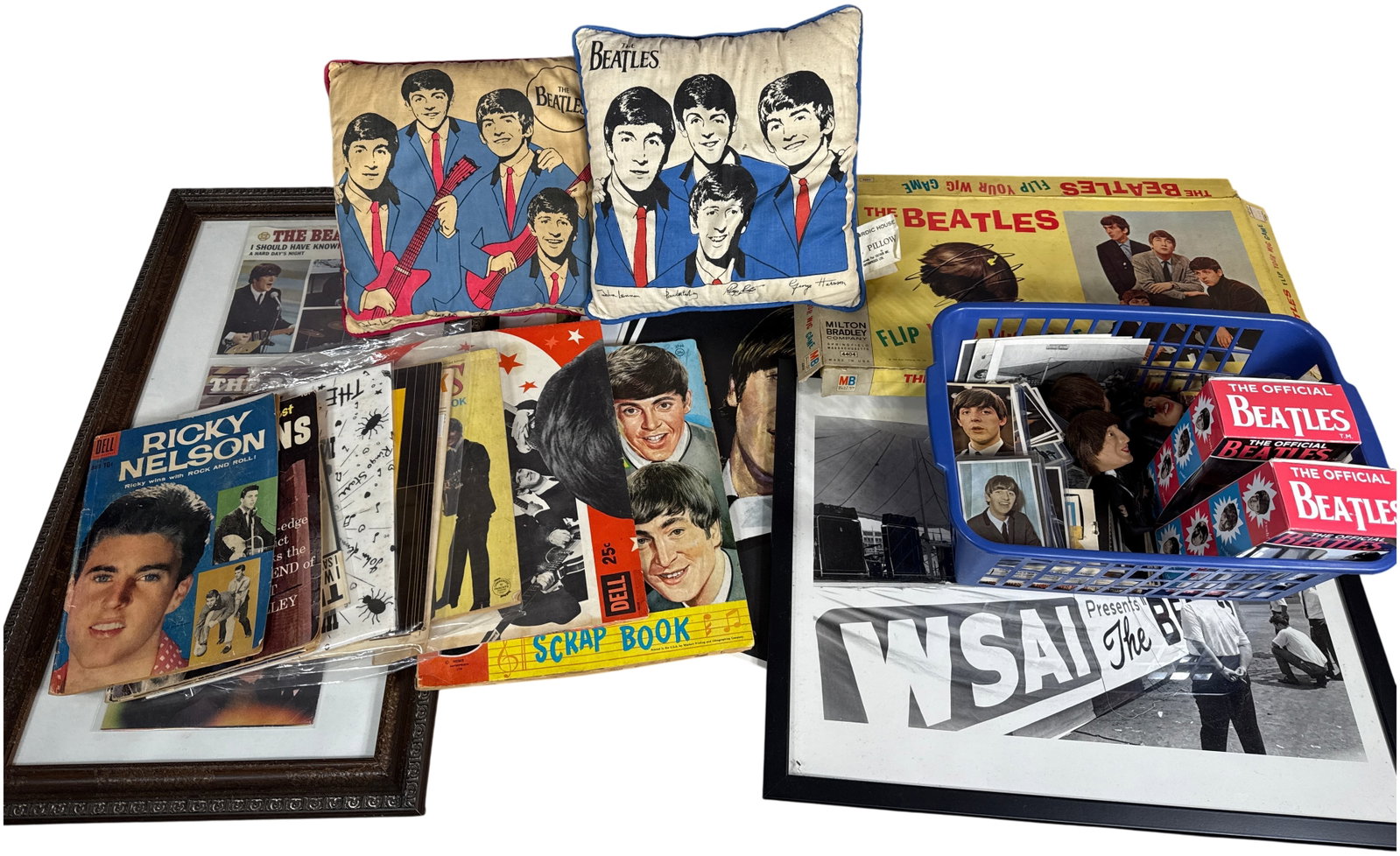 An Assortment of Vintage 1960s The Beatles and Pop Culture Memorabilia: This collection features a significant archive of 1960s memorabilia, predominantly focused on the musical career of The Beatles. Key items include a Milton Bradley Flip Your Wig board game, model numb