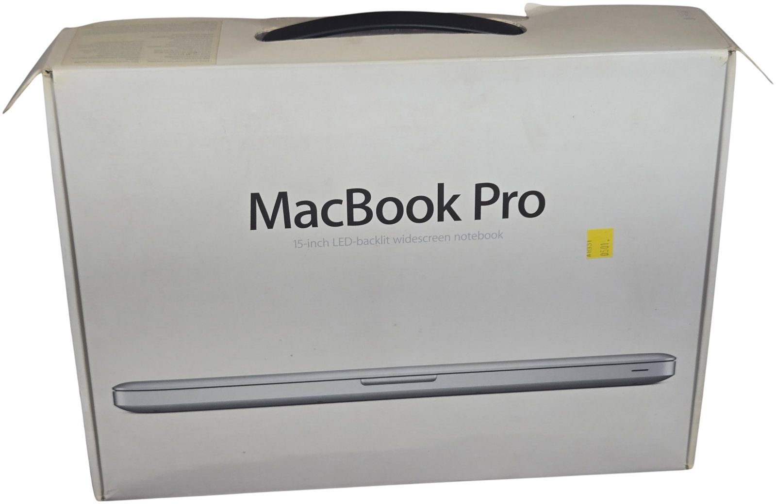 Apple MacBook Pro 15-inch Laptop with Original Packaging and Accessories: This lot features an Apple MacBook Pro 15-inch laptop utilizing the silver aluminum Unibody design. The device is equipped with a 15-inch LED-backlit widescreen display and a slot-loading optical driv