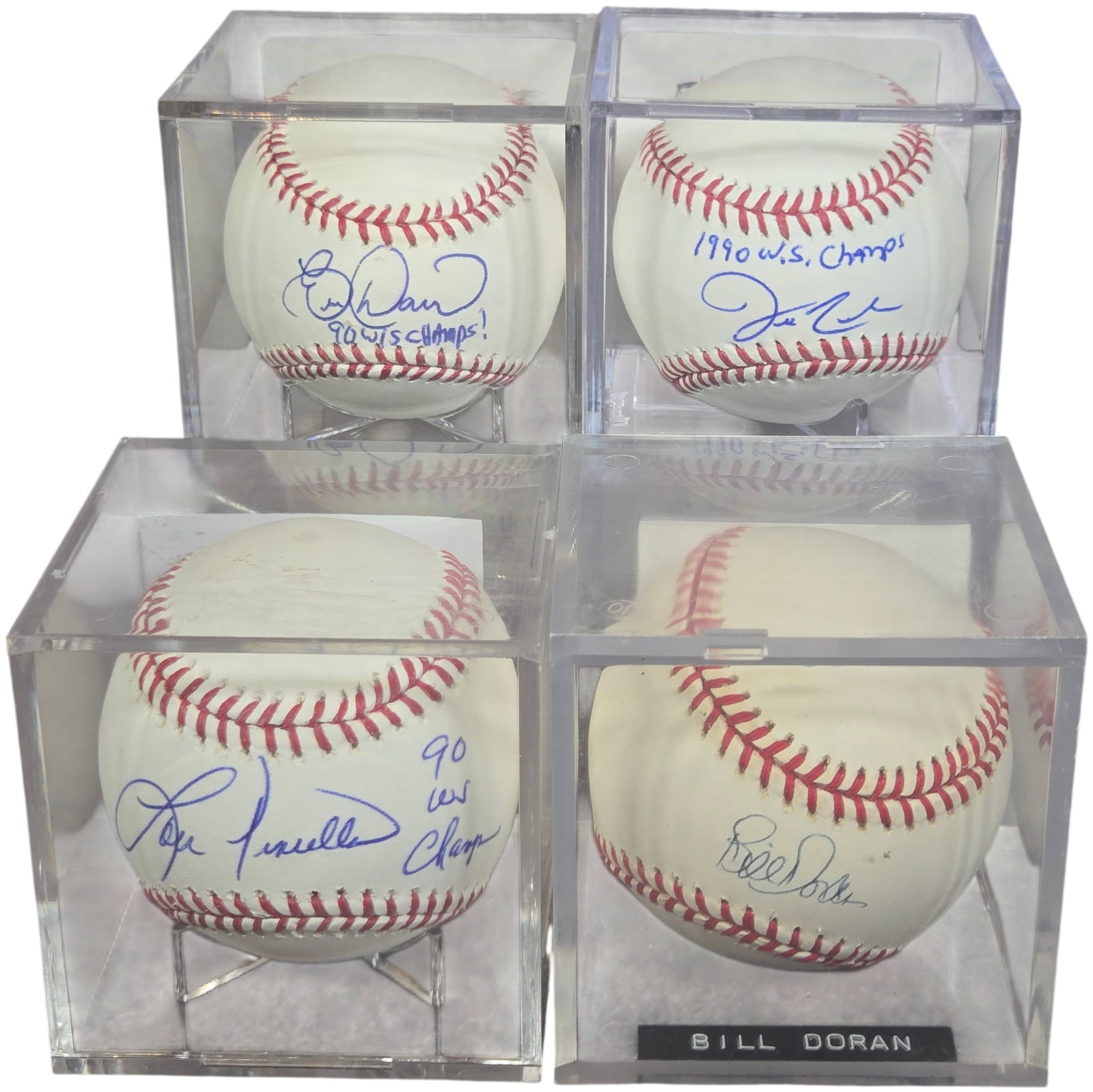 A Collection of Autographed Cincinnati Reds 1990 World Series Champion Baseballs: This collection consists of several individually autographed baseballs featuring members of the 1990 World Series Champion Cincinnati Reds. Each baseball is signed in blue ink on the sweet spot and is