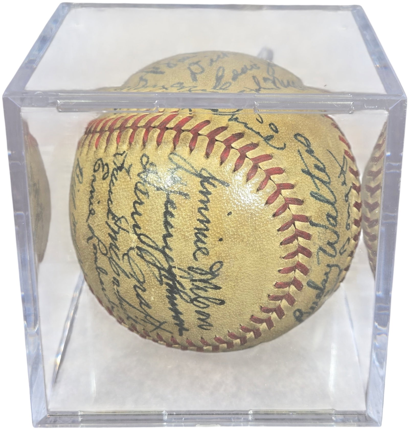Team-Signed 1940 Cincinnati Reds World Series Champions Baseball: This vintage team-signed baseball features members of the 1940 Cincinnati Reds, the year the franchise won the World Series title. The ball contains signatures from key players of the championship ros