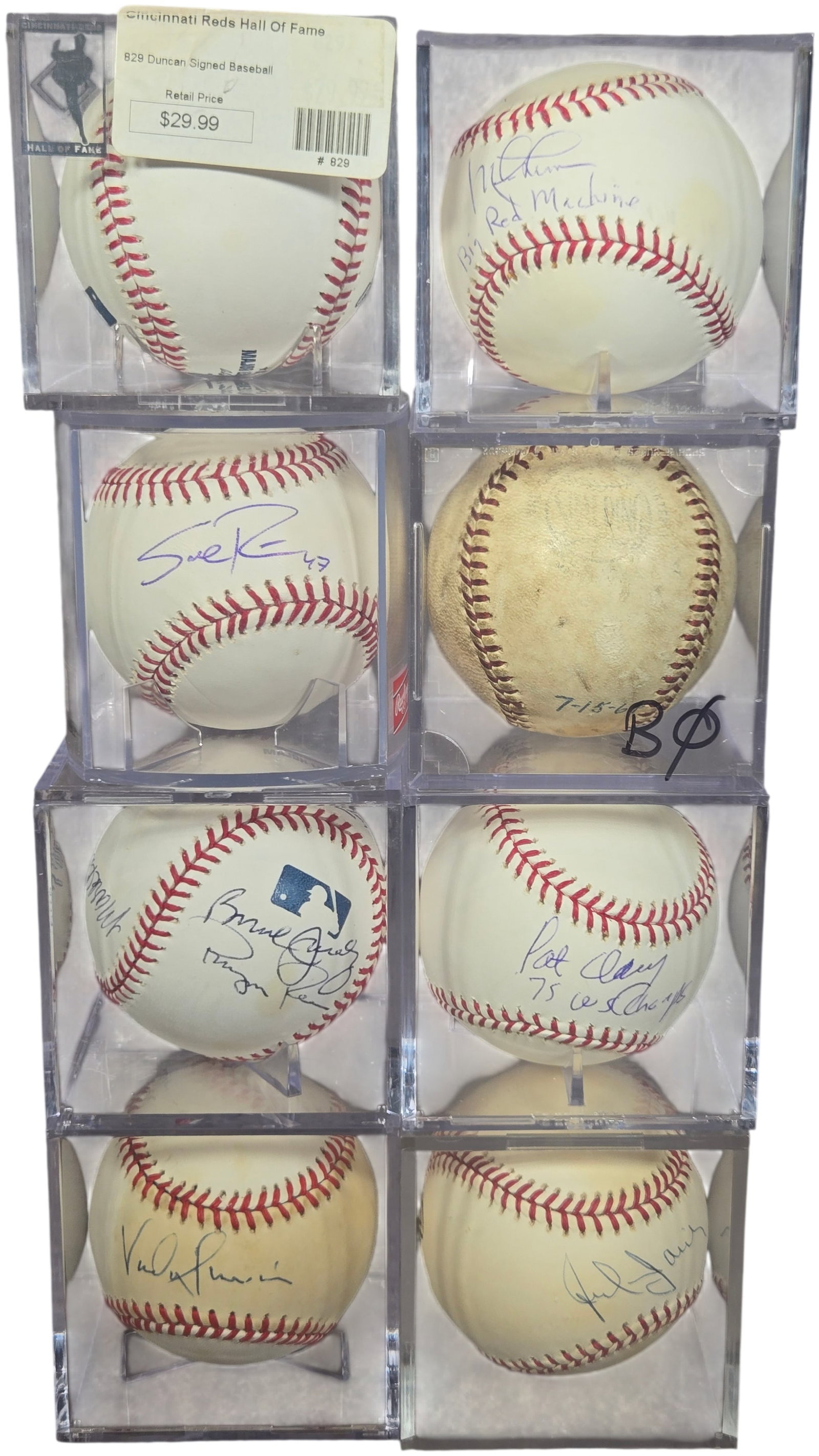 A Collection of Autographed Baseballs Featuring Cincinnati Reds Players and MLB Managerial Staff: A collection of baseballs, primarily featuring autographs from players and staff associated with the Cincinnati Reds. The group includes a group of single-signed baseballs: Bill McCool (inscribed Big 