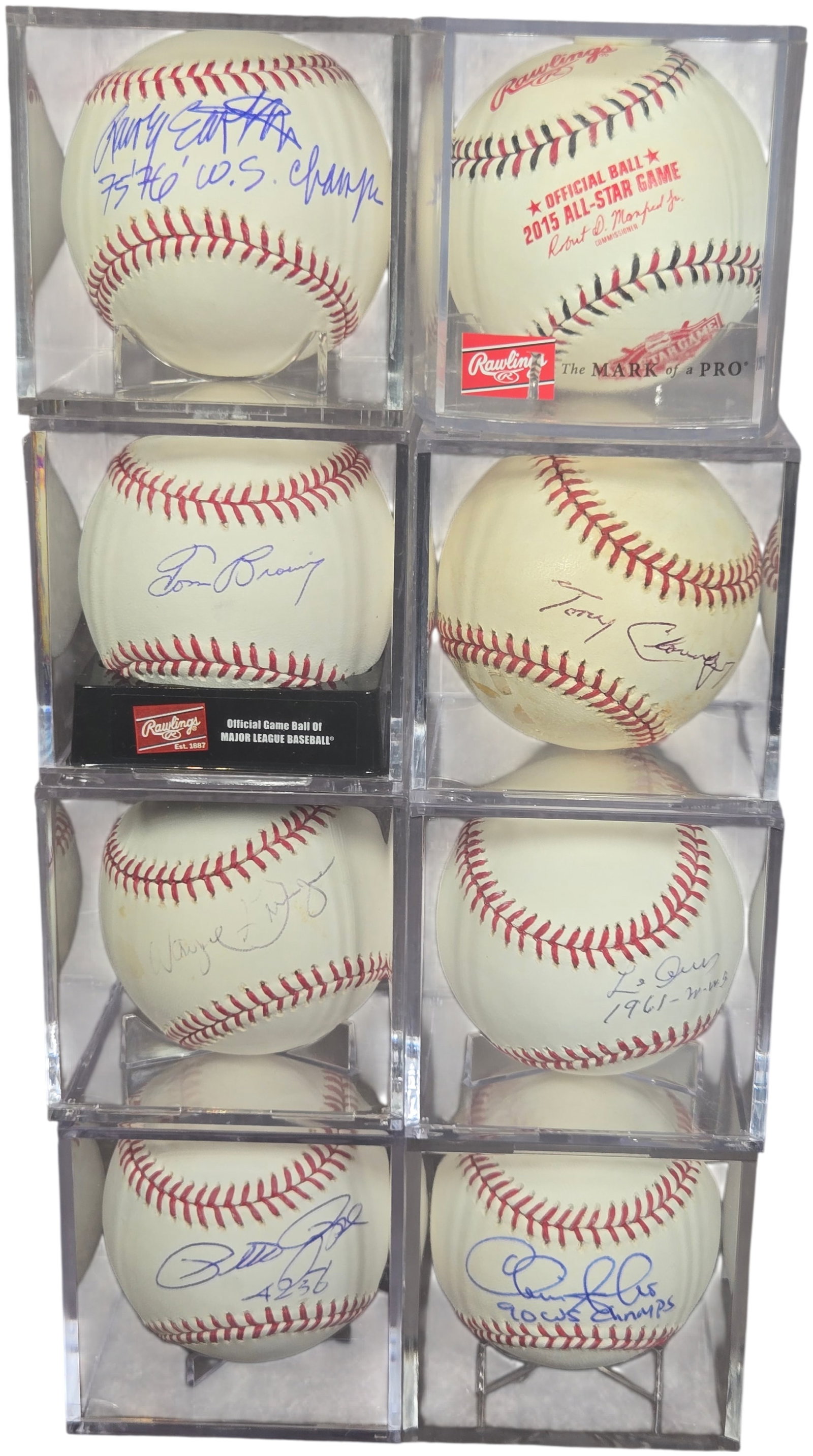 A Collection of Cincinnati Reds Autographed and Commemorative Baseballs: A collection of autographed and commemorative baseballs primarily associated with the Cincinnati Reds Major League Baseball franchise. The assortment includes a Rawlings Official Major League Baseball