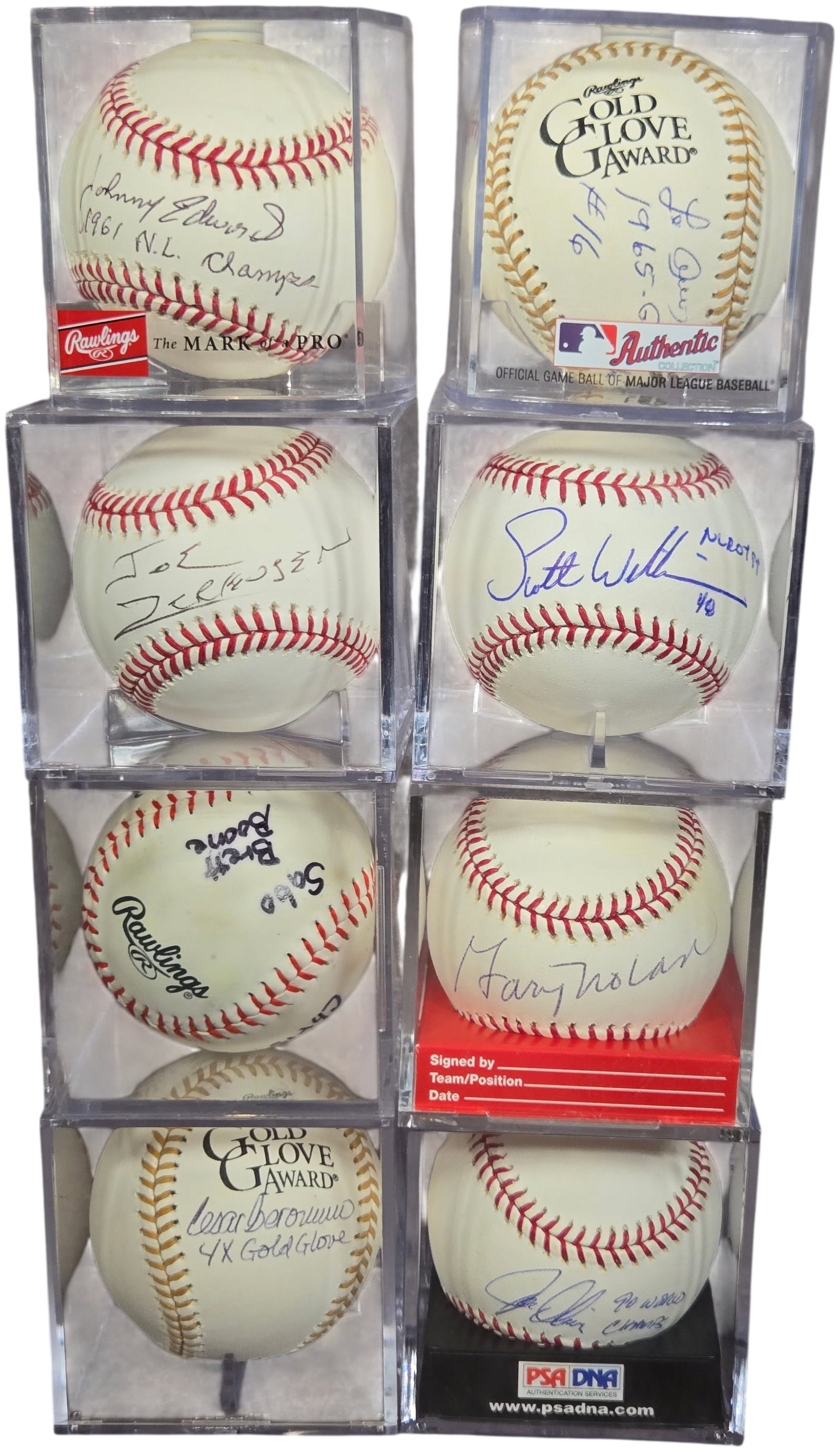 A Collection of Cincinnati Reds Autographed and Souvenir Baseballs including PSA DNA Certified Danny: This collection consists of multiple autographed and souvenir baseballs primarily featuring players and broadcasters associated with the Cincinnati Reds organization. The items are individually housed
