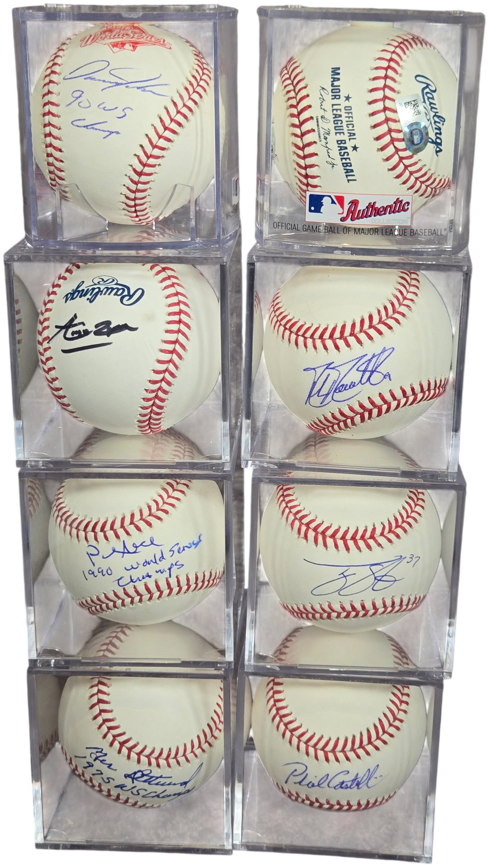 A Collection of Autographed Major League Baseballs Featuring Ken Griffey Jr. and Pete Rose: A collection of autographed baseballs, primarily consisting of Rawlings Official Major League Baseballs. The collection includes individual balls signed by several prominent players, many of whom are