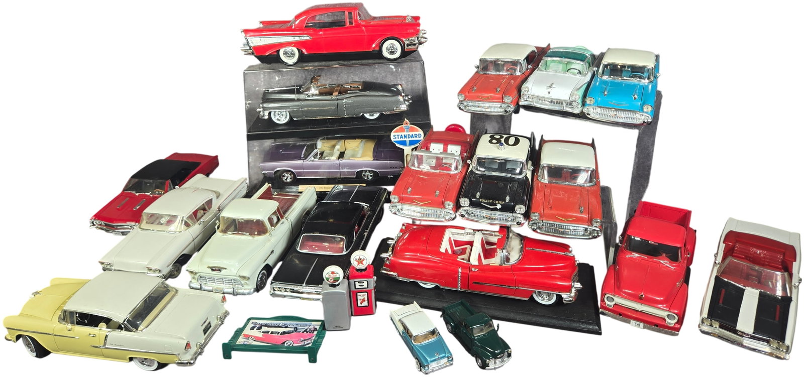 A collection of Die-Cast Model Vehicles and Gas Station Accessories by Ertl, Maisto, and Others (1 of 20)