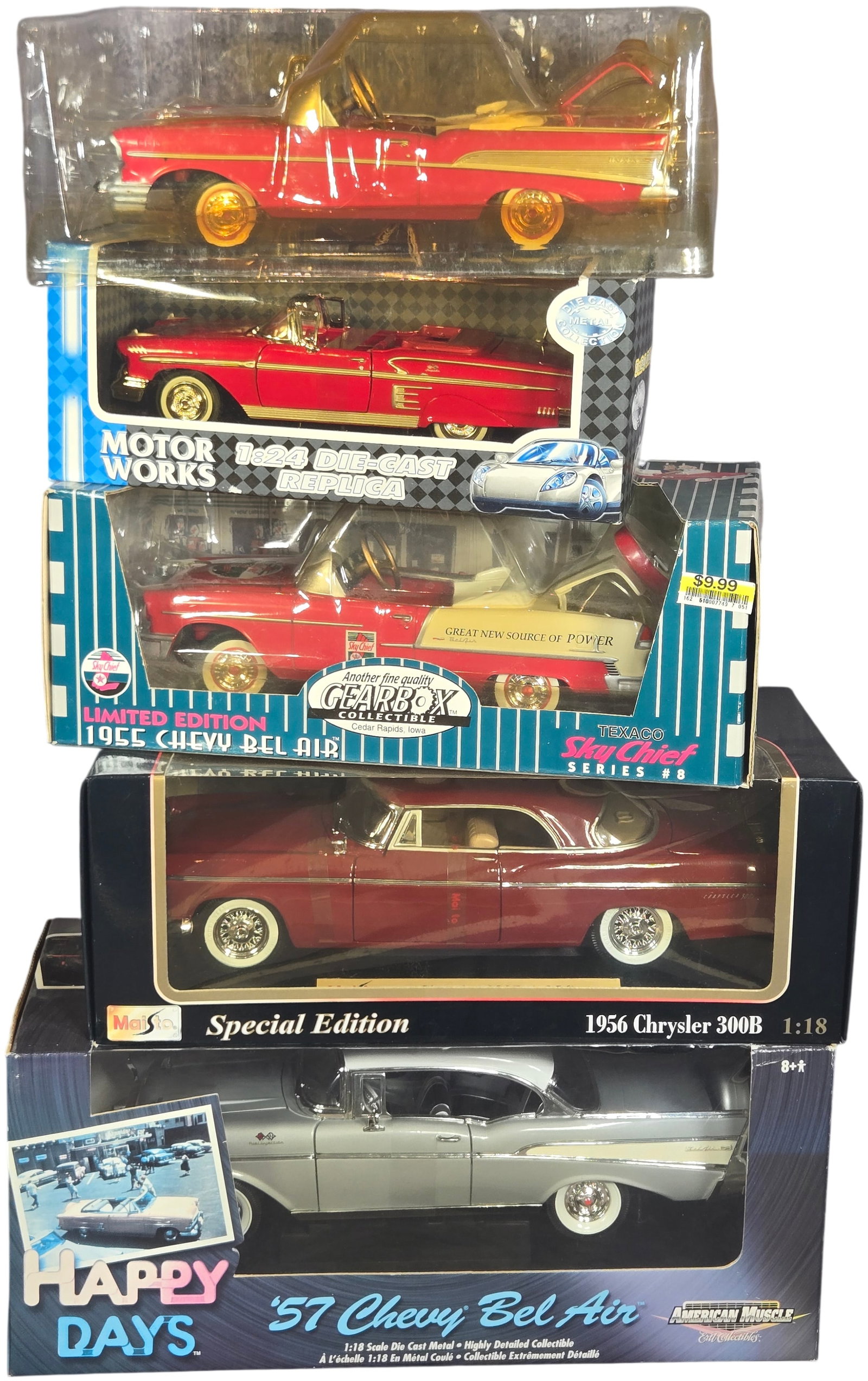 A Collection of Die-Cast Model Cars Including American Muscle and Maisto: A group of die-cast model cars in 1:18 and 1:a group of scales, including 1950s Chevrolet and Chrysler models by makers such as American Muscle, Maisto, and Ertl. Burns in-house shipping is available.