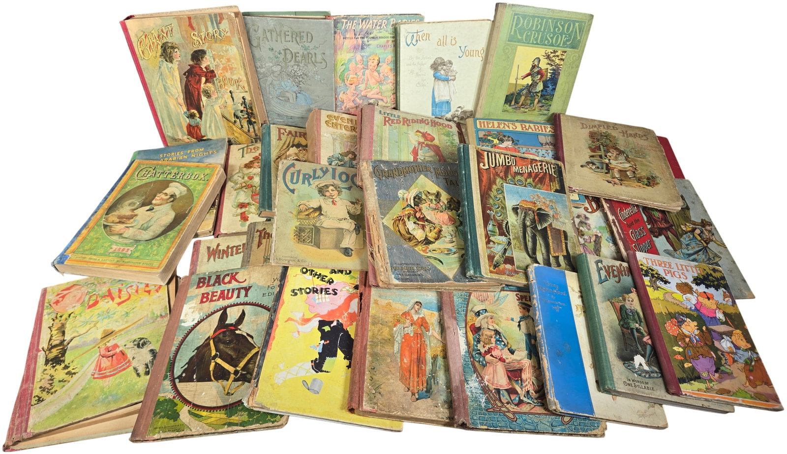 A Collection of Antique and Vintage Children's Books and Annuals. Various Publishers, circa: This is an extensive collection of antique and vintage children's books and annuals, primarily dating from the late 19th to the early 20th century. The volumes feature highly decorative chromolithogra