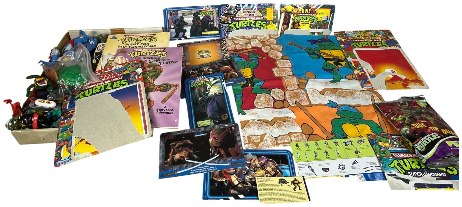 A Collection of Vintage Teenage Mutant Ninja Turtles Action Figures and Memorabilia by Playmates and (1 of 14)