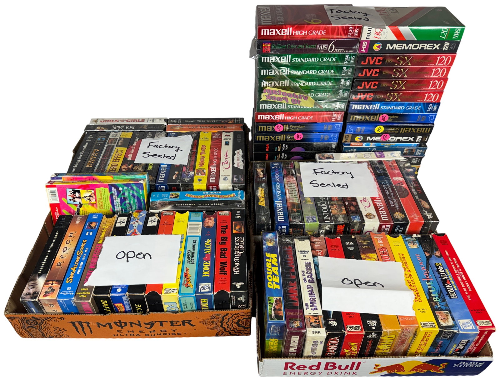 An Assortment of Factory Sealed and Open VHS Tapes, DVDs, and Blank Media (1 of 16)
