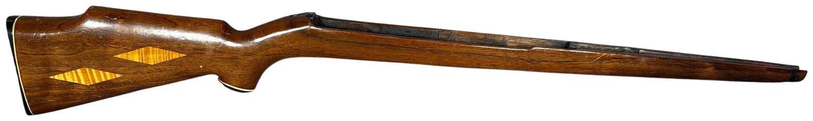 Bishop Custom Walnut Bolt Action Rifle Stock with Maple Inlays: A vintage Bishop custom rifle stock crafted from walnut, designed for a bolt-action rifle. The stock features a Monte Carlo cheekpiece and a pistol grip with a black decorative cap and white-line spac