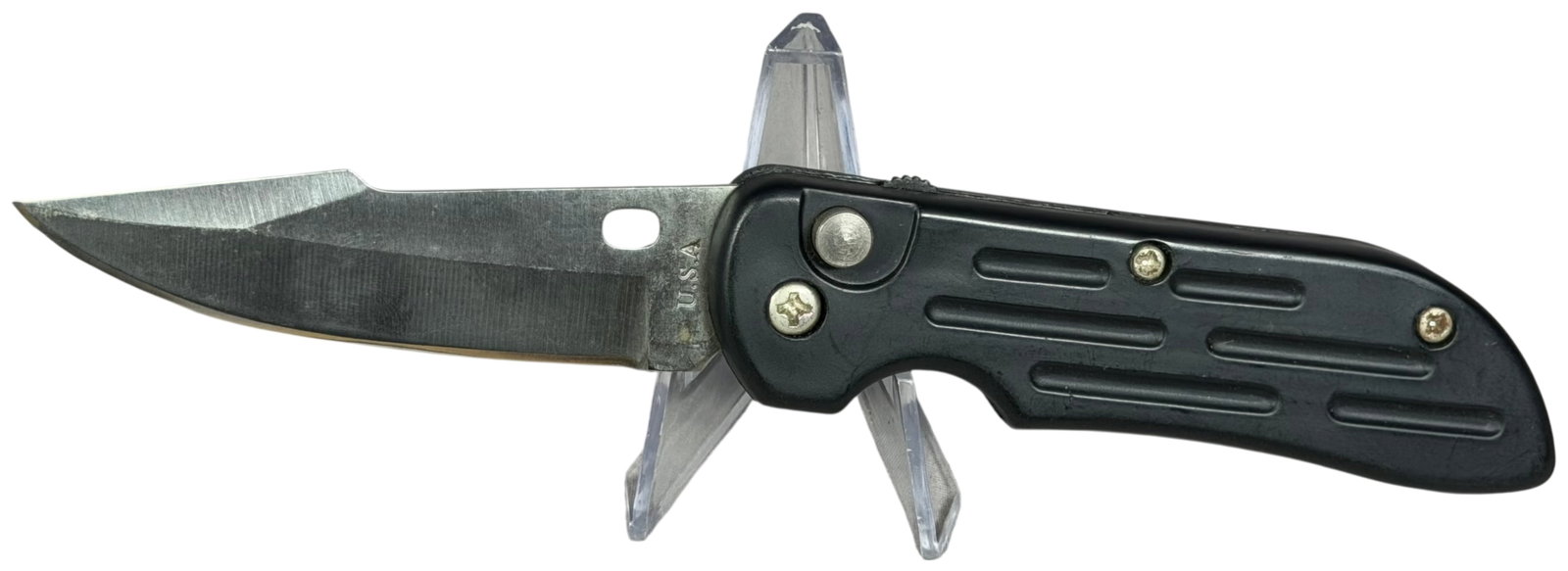 U.S.A. Made Automatic Folding Pocket Knife with Black Anodized Aluminum Handles: A single-blade automatic folding pocket knife featuring a stainless steel clip-point blade with a satin finish and an oval thumb hole near the spine. The presentation side ricasso is stamped