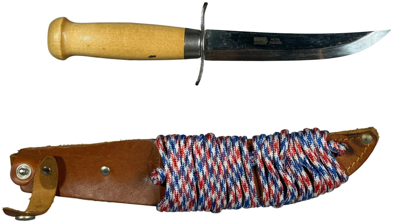 Vintage Edge Mark Mora Sweden Scout Fixed Blade Knife with Leather Sheath: Vintage Edge Mark Scout fixed blade hunting and utility knife manufactured in Mora, Sweden. The blade features a clip point profile with a stamped logo consisting of Edge Mark inside a stylized tag an