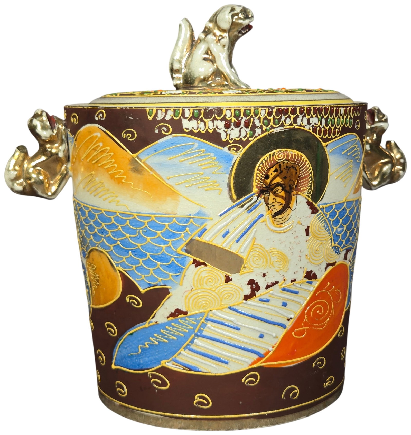 Tashiro Shoten Japanese Satsuma Moriage Lidded Ice Bucket: Produced by Tashiro Shoten (Tashiro Trading Company) in Nagoya, this lidded vessel is an example of early 20th-century Japanese export earthenware. The piece is decorated in the Satsuma style featurin