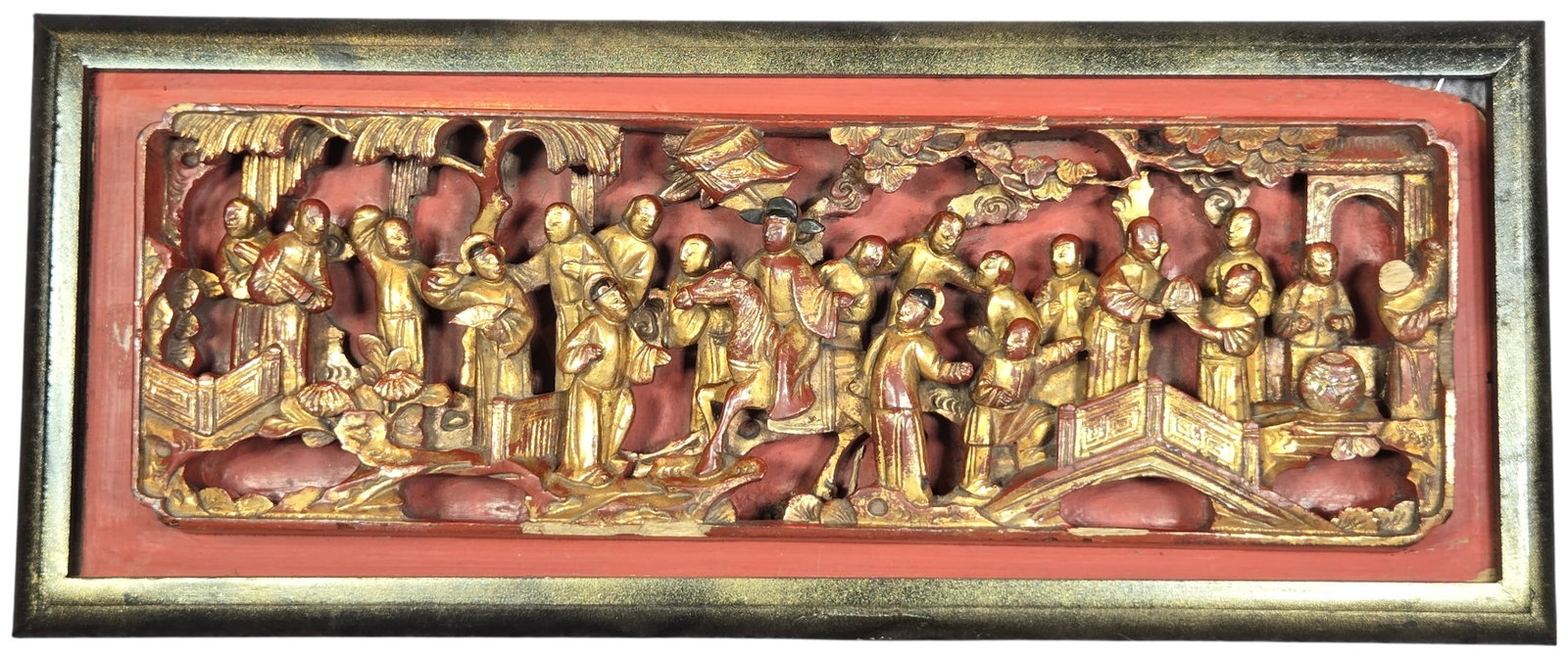 Chinese Gilt and Red Lacquer Deep Relief Carved Wood Panel: A Chinese hand-carved wood panel from the late 19th to early 20th century. This architectural element features deeply undercut relief carving, also known as pierced carving, depicting a detailed narra