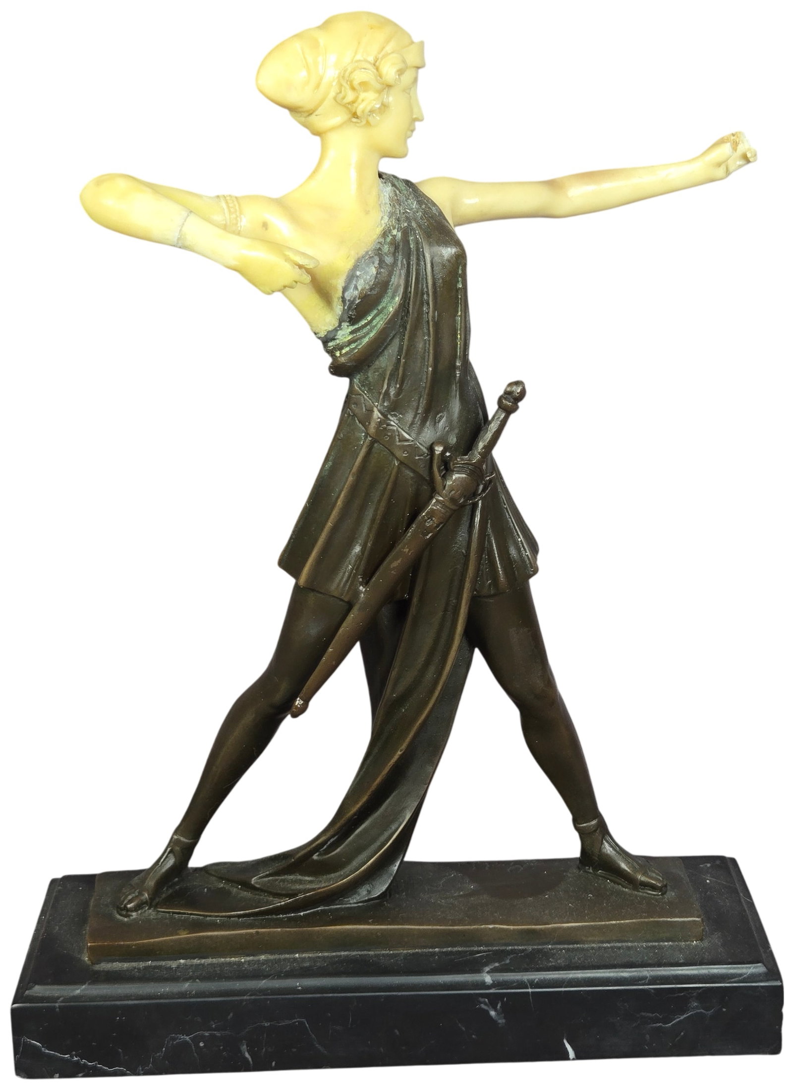 Ferdinand Preiss Art Deco Chryselephantine Amazon Archer Sculpture: This Art Deco chryselephantine sculpture, signed Preiss, depicts an Amazon archer in a dynamic lunging pose. The figure is rendered with the head, torso, and arms in a carved cream-colored material,