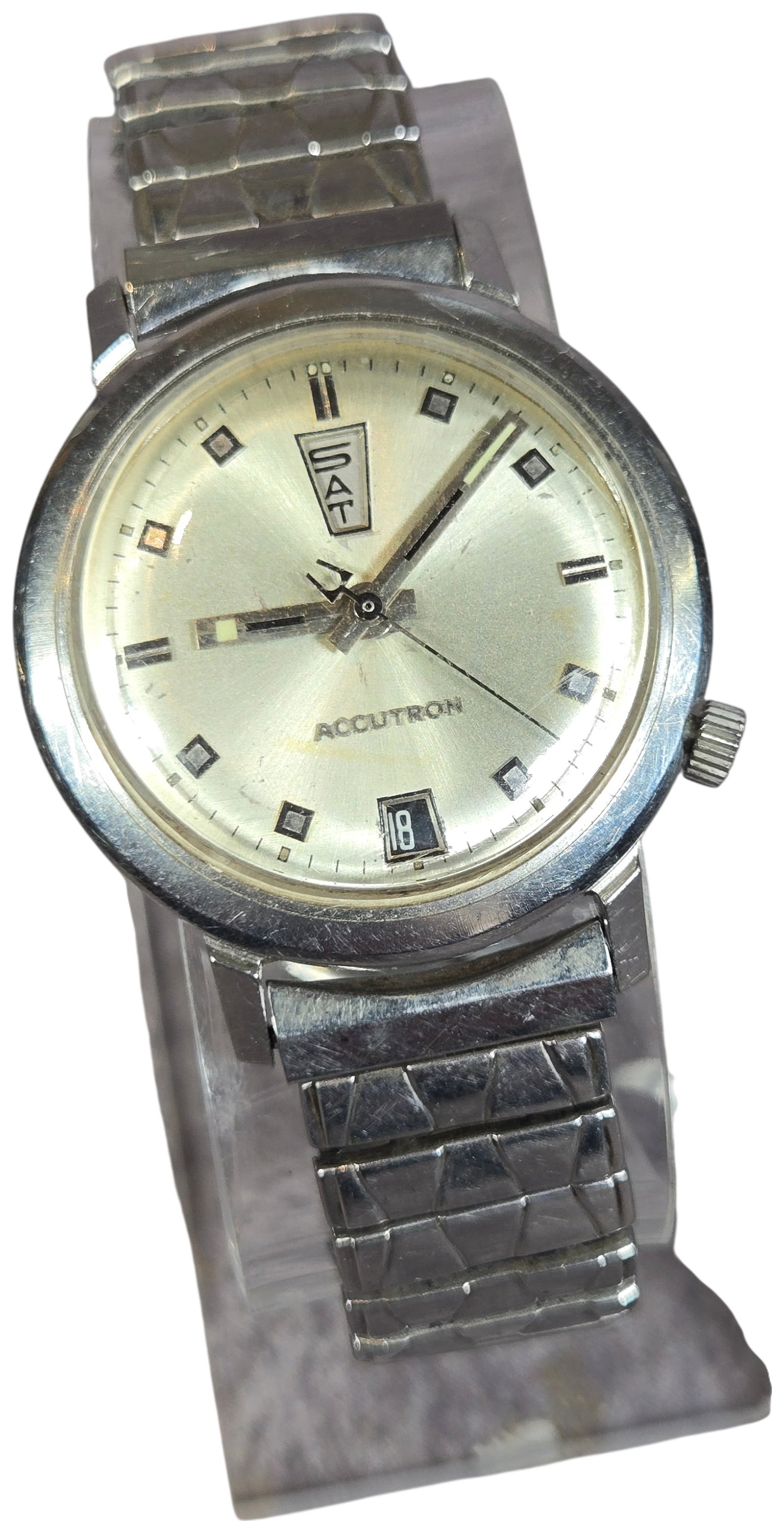 1968 Bulova Accutron Day-Date Stainless Steel Wristwatch: Bulova Accutron Day-Date wristwatch, model 2182, featuring an electronic tuning fork movement. The stainless steel case is designed with a round bezel and a recessed crown located at the 2 o'clock